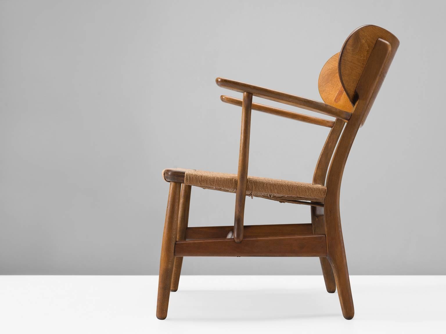 Hans J. Wegner for Carl Hansen & Søn, armchair model CH22 by Denmark, 1950.

This chair is one of Wegner's early masterpieces for Carl Hansen. The chair bears the first number of a highly interesting collection that was realized during the