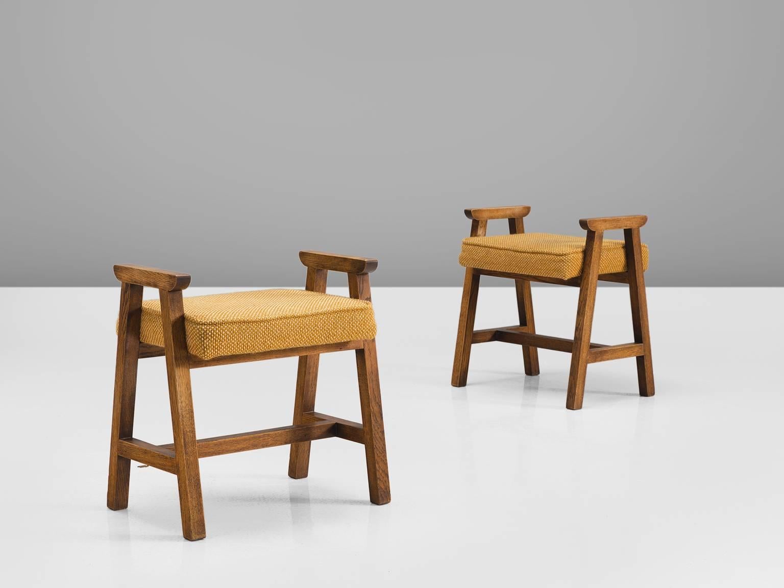 Guillerme et Chambron, set of two stools, oak and yellow fabric, France, 1960s. 

This duo of solid oak wooden stools with the muted yellow colors are designed by the French designer duo Guillerme and Chambron. These stools have a frame in oak