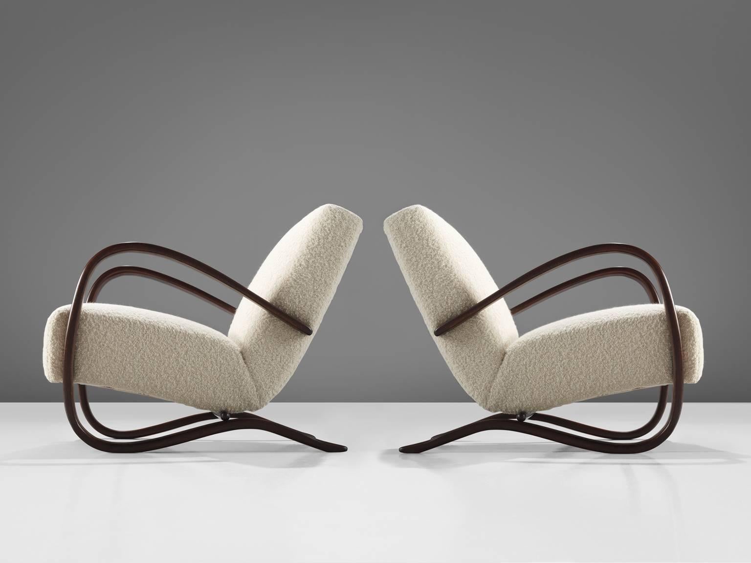 Jindrich Halabala, lounge chairs, Pierre Frey fabric and wood, Czech-Republic, 1930s 

This pair of Halabala chairs are upholstered in our own upholstery studio. The main feature of this chair by Hindrich Halabala are the voluptuous curved