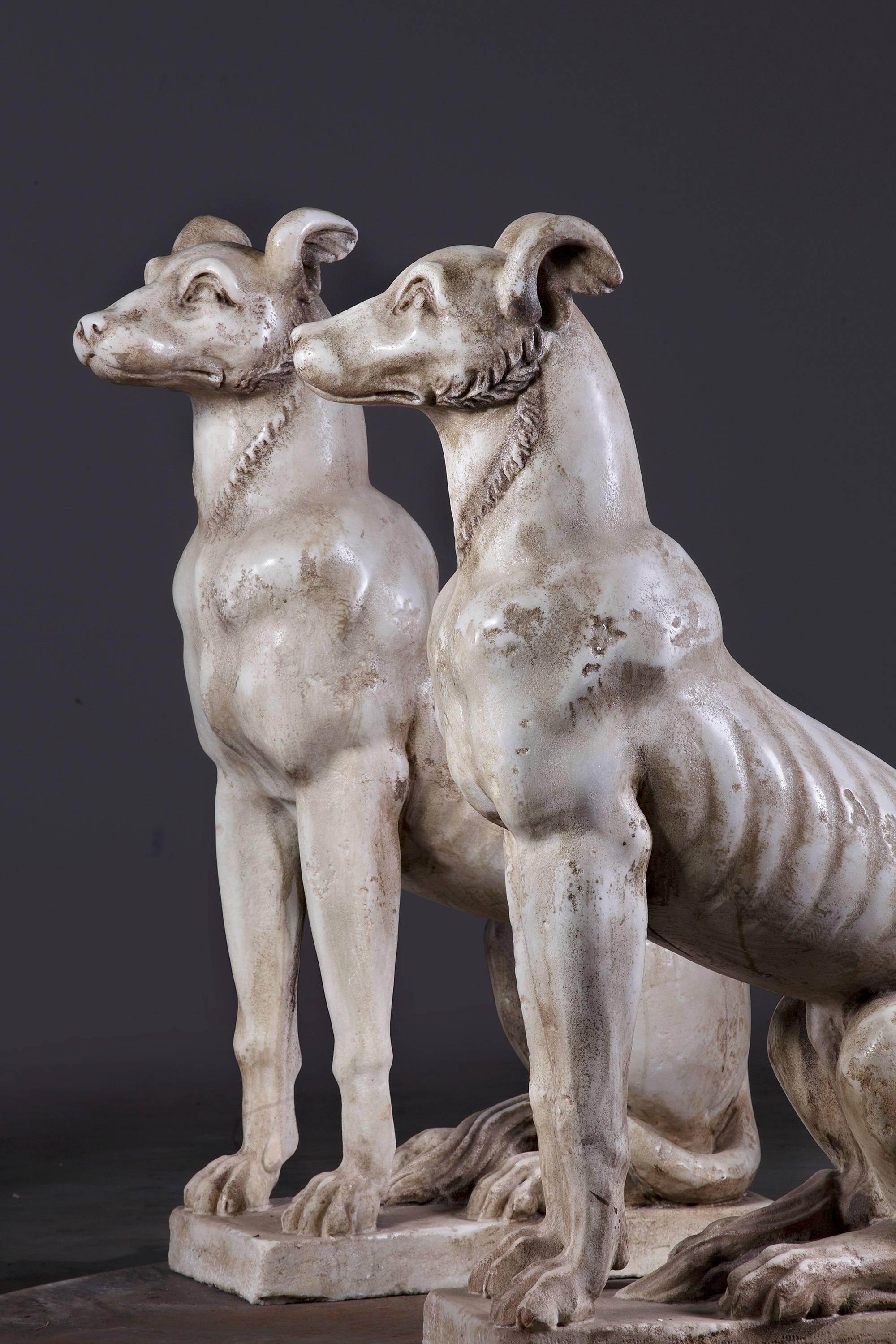 Other Pair of Continental Sculpted White Marble Seated Hounds