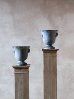 Antique French cast iron garden urns by Paris en Cie