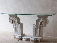 Antique marble console table composed of baroque elements with a glass top