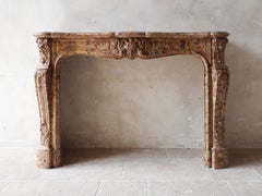 Monumental French Antique Louis XIV Brèche d'Alep Marble Fireplace Mantel