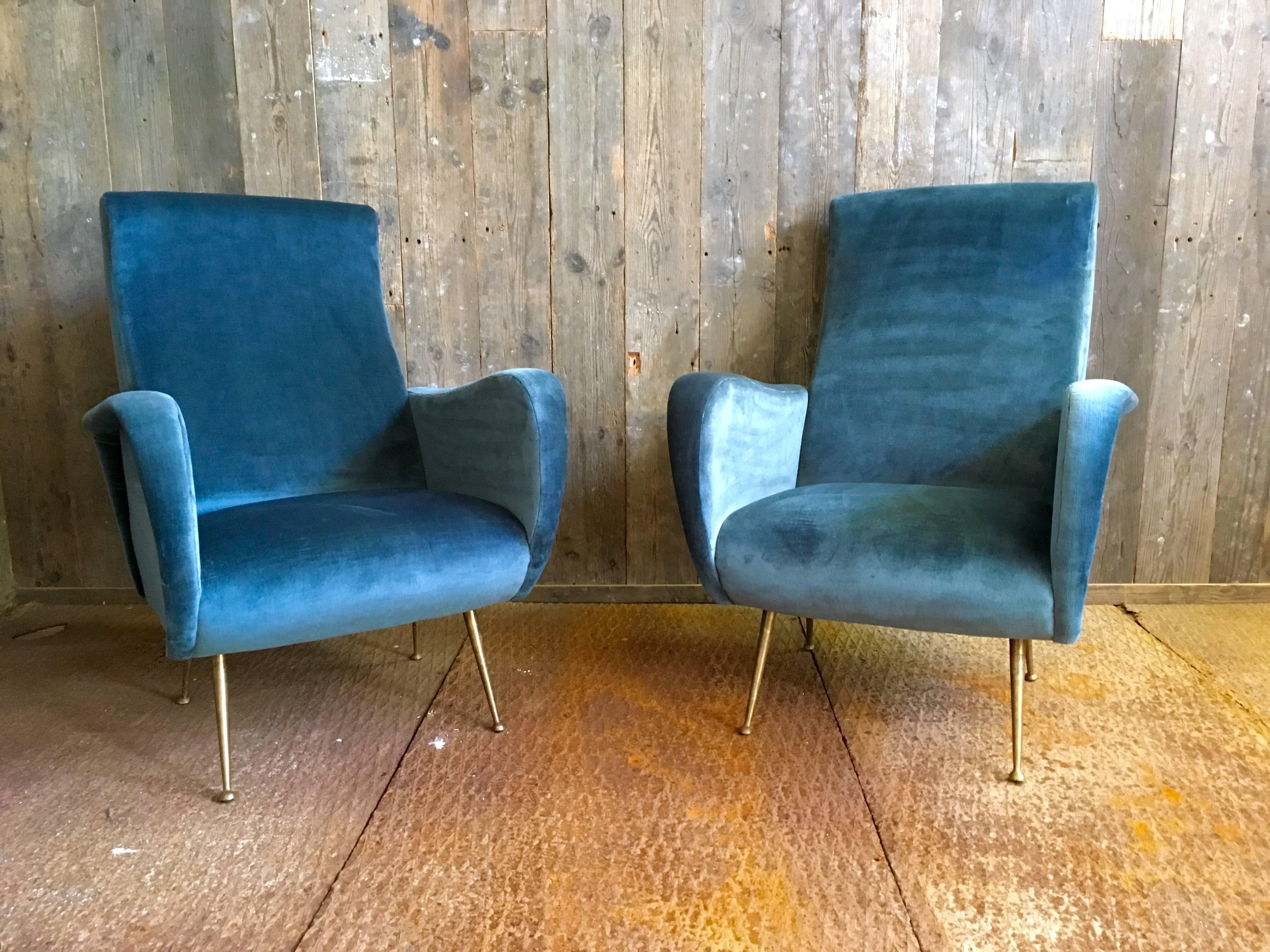 Two lady chairs by Marco Zanuso in beautiful petrol blue velvet.

Marco Zanuso (1916-2001) was a famous Italian designer who had a major influence on the world of design. Nowadays his work can be found in the Museum of Modern Art in New York and