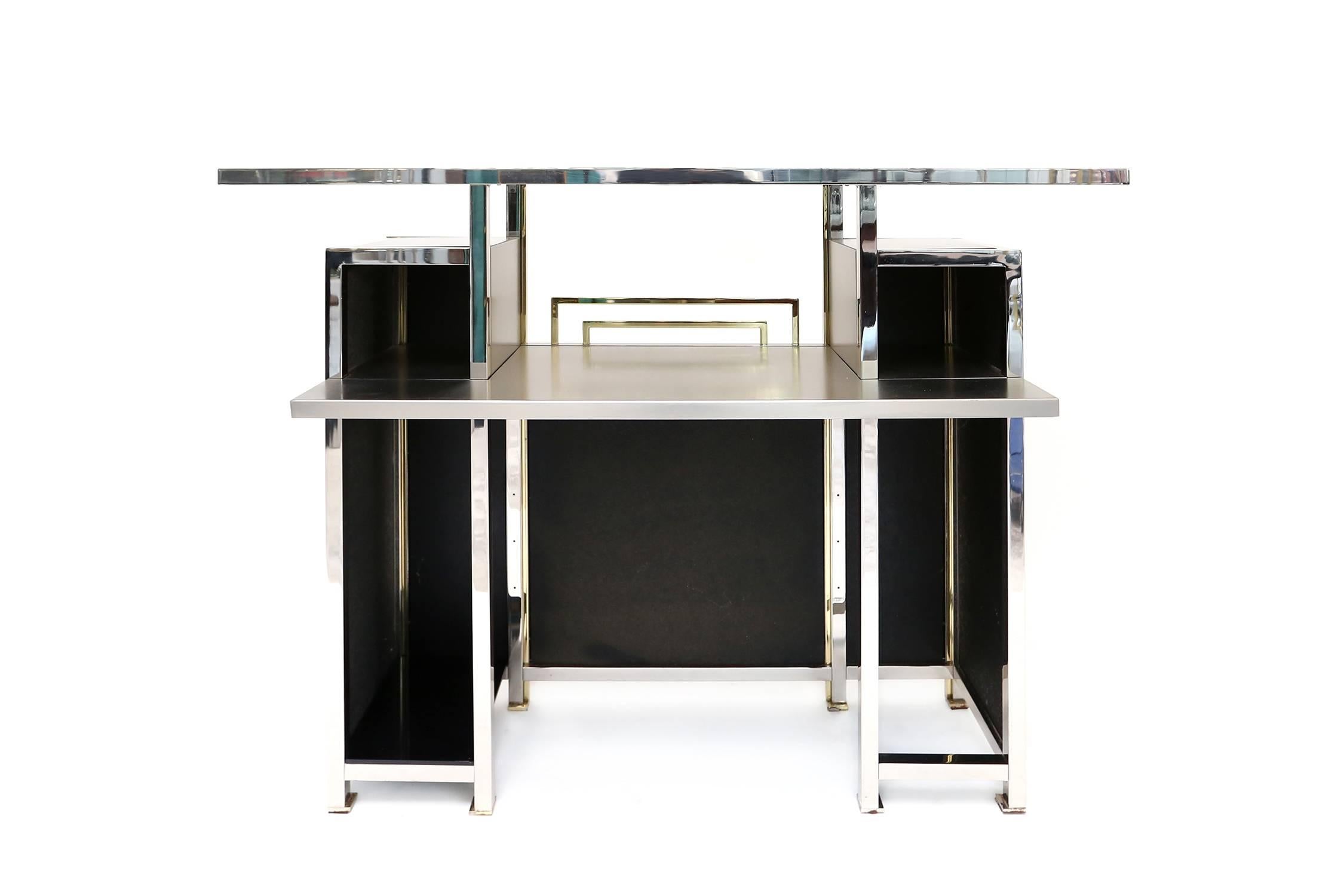 Chrome  brass  stainless steel bar piece by Maison Jansen an exquisite and very rare item. A possible match with the Maison Jansen bar stools. Measures: L 150 cm, D 50 cm, H 78 cm.