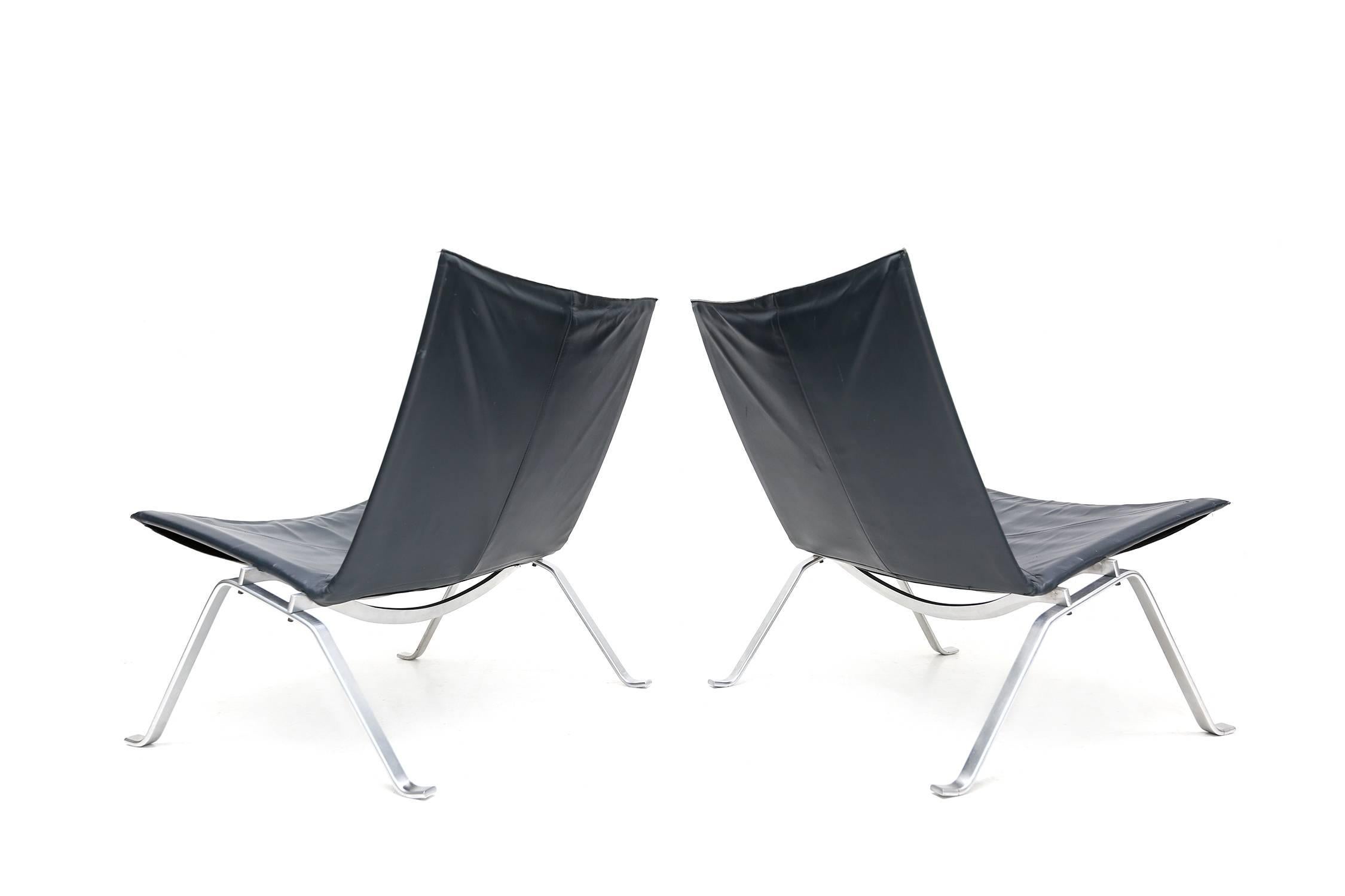 Pair of black leather PK22 chairs
by Poul Kjaerholm for Kold Christensen,
Denmark, circa 1960.
 