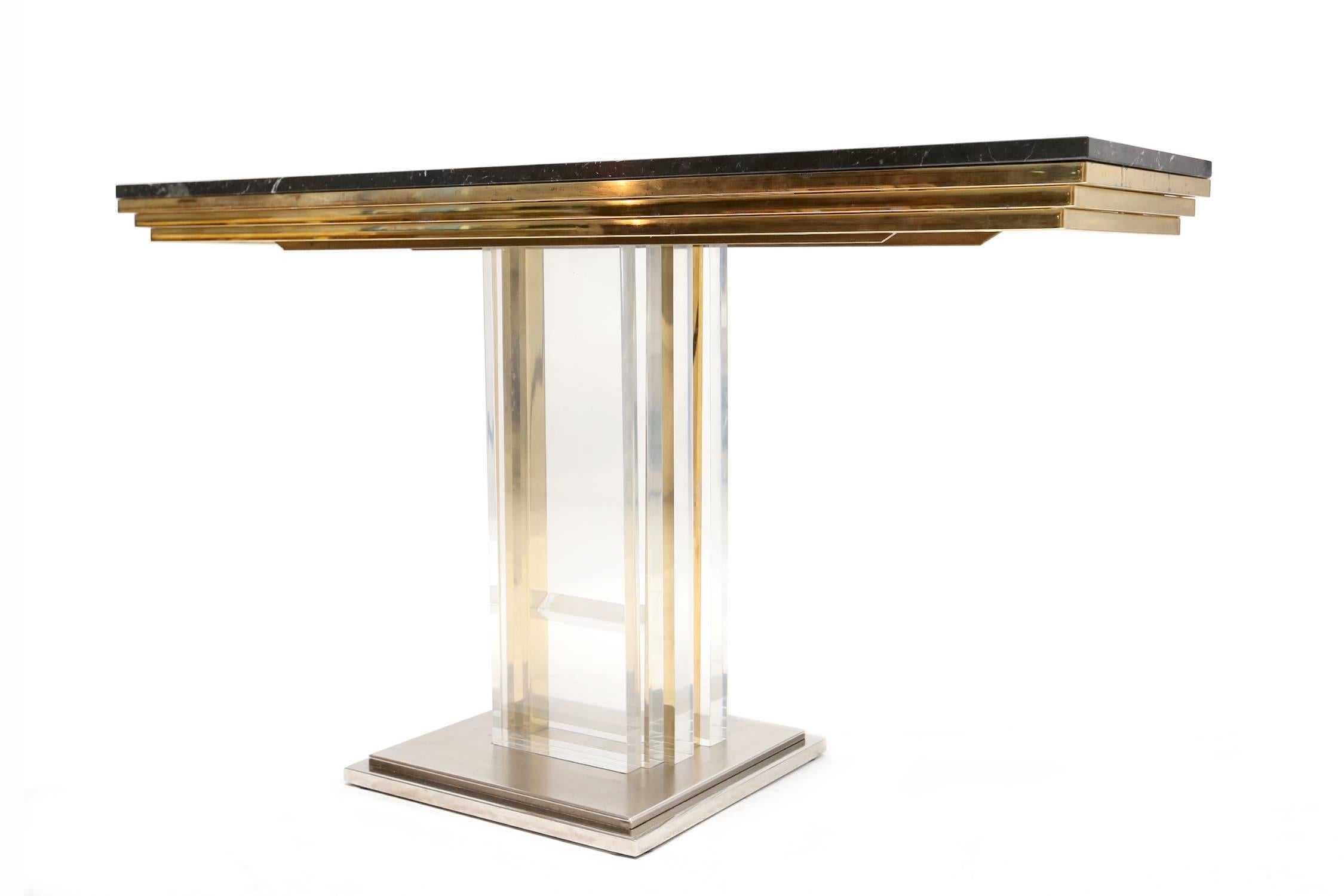 Great 1970s Belgo chrome console.
Nero Marquina marble top.
Brass Perspex chrome.
Measures: L 140 cm H 77 cm D 40 cm.
We have a pair available !