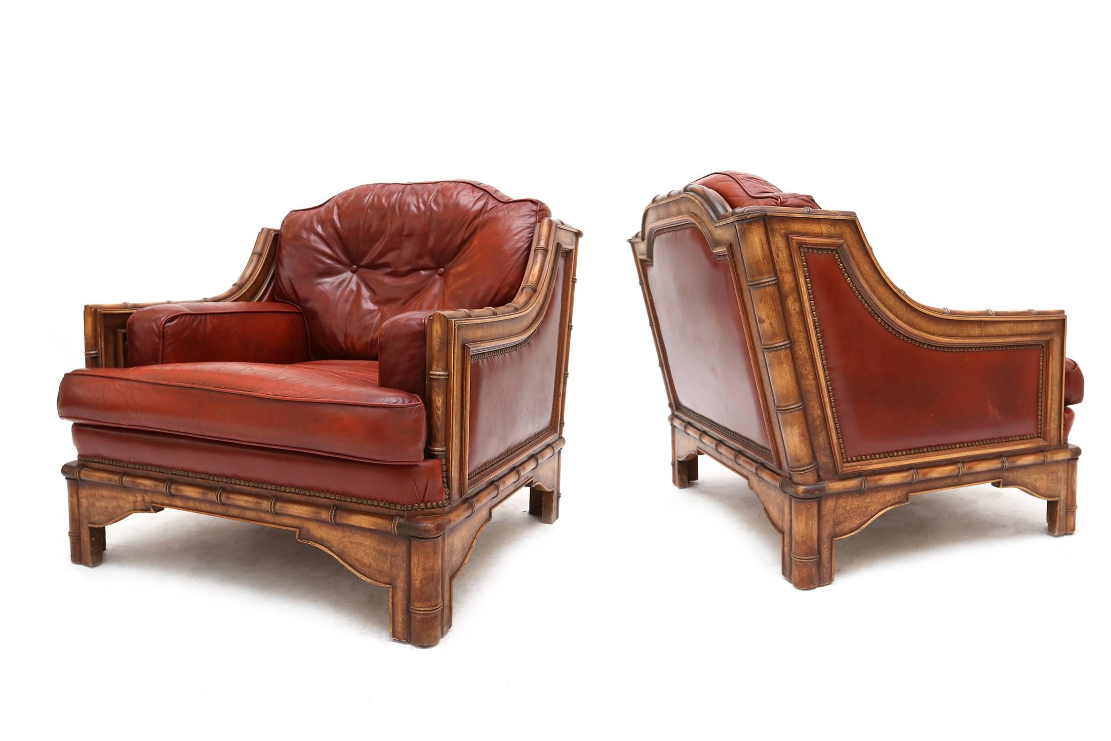 Chinoiserie red leather bamboo,
oriental style pair of club chairs, 1960s.
     