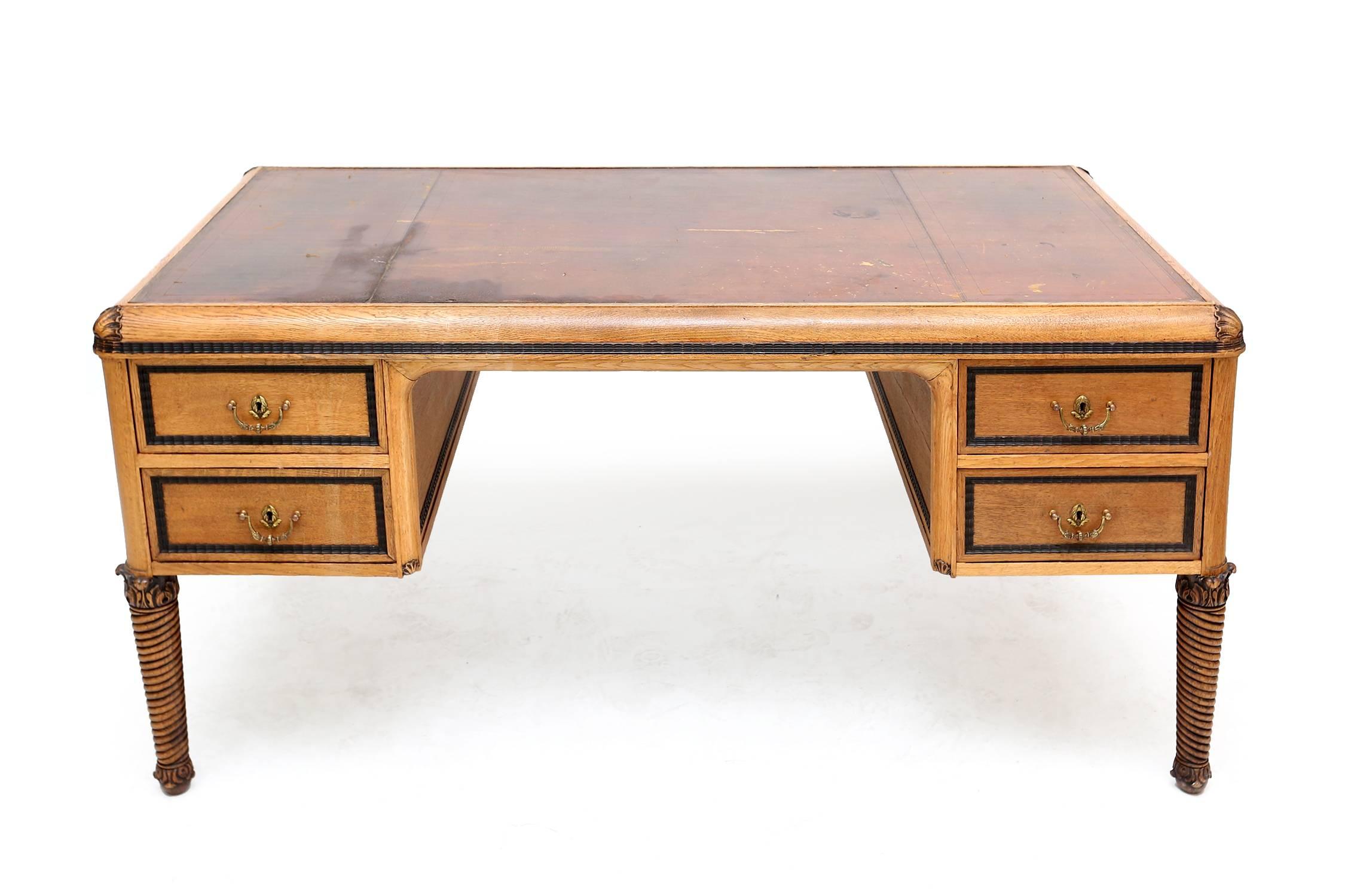 Awesome desk by Maison Franck
in very good condition ¬ some wear on the leather top
stunning turned legs with acanthus leafs
the desk looks exactly the same from each side,
Belgium, circa 1920.
 