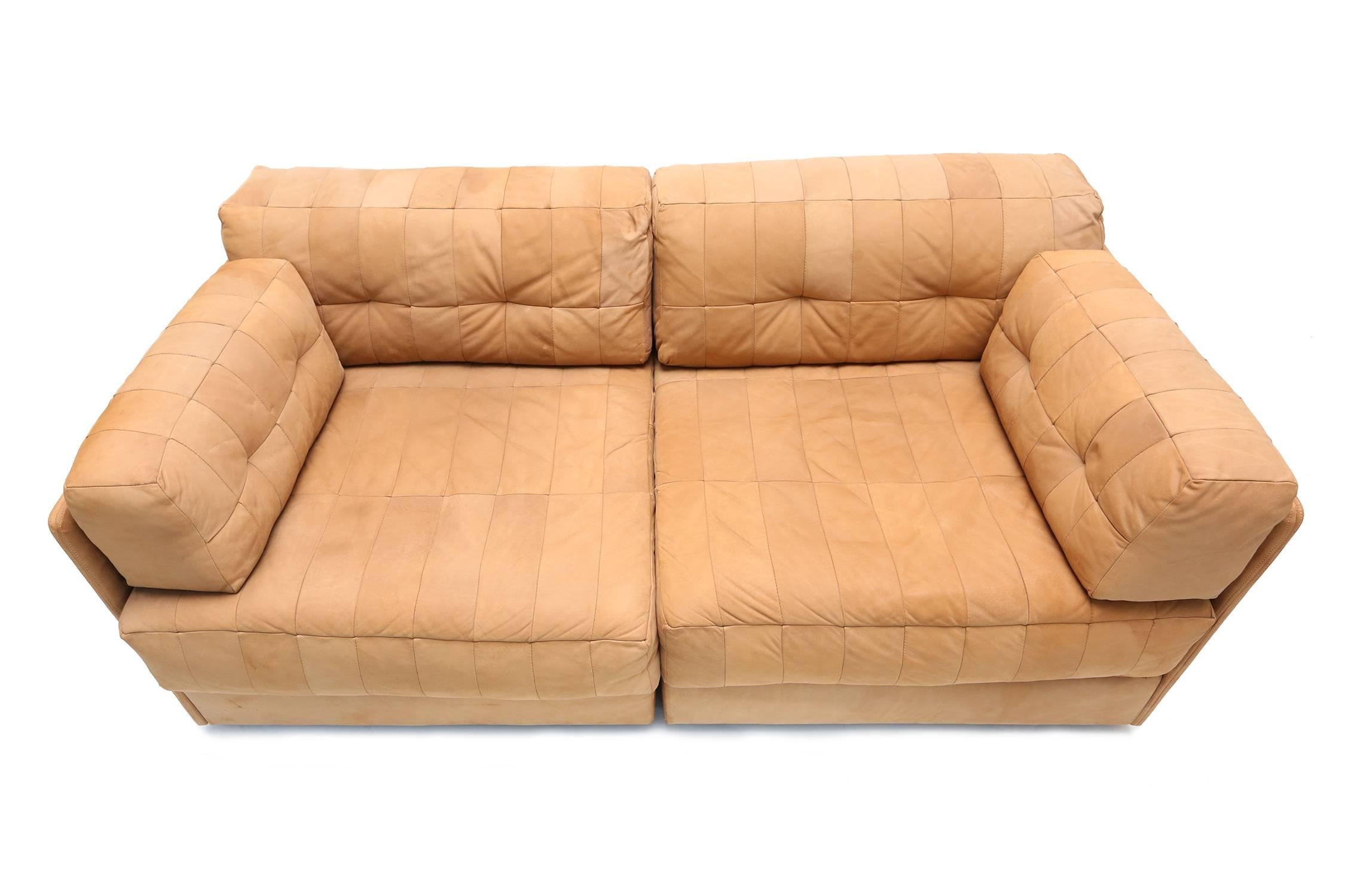 Very rare De Sede model DS 76 patchwork sofa
consisting of two extractable elements
natural nubuck leather,
Switzerland, 1970s.
Measures: W 164 cm, D 82 cm, H 70 cm.
 