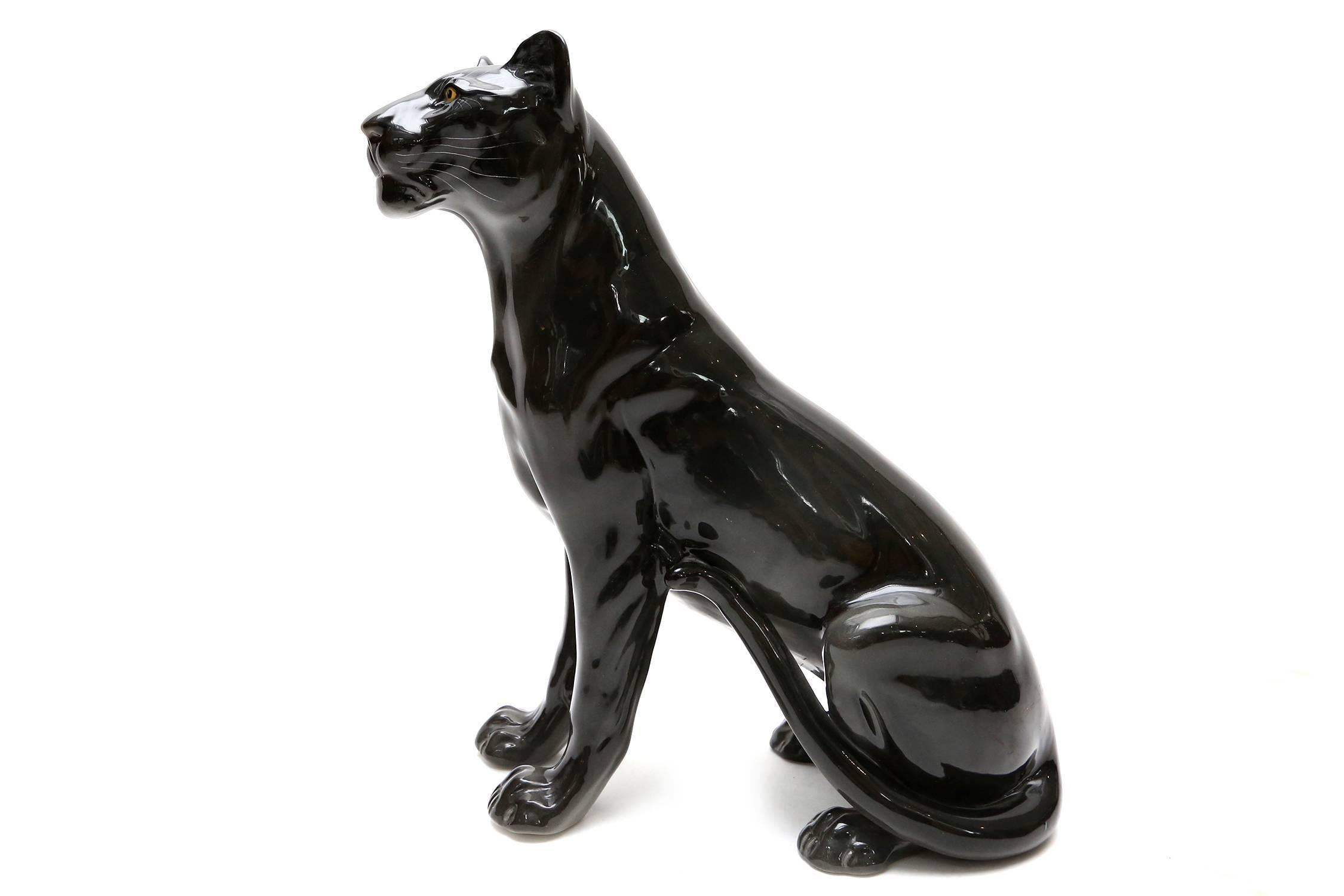 Black glazed ceramic panther,
Italy, circa 1970.
Signed by the artist.
W 15 cm, L 30 cm, H 38 cm.