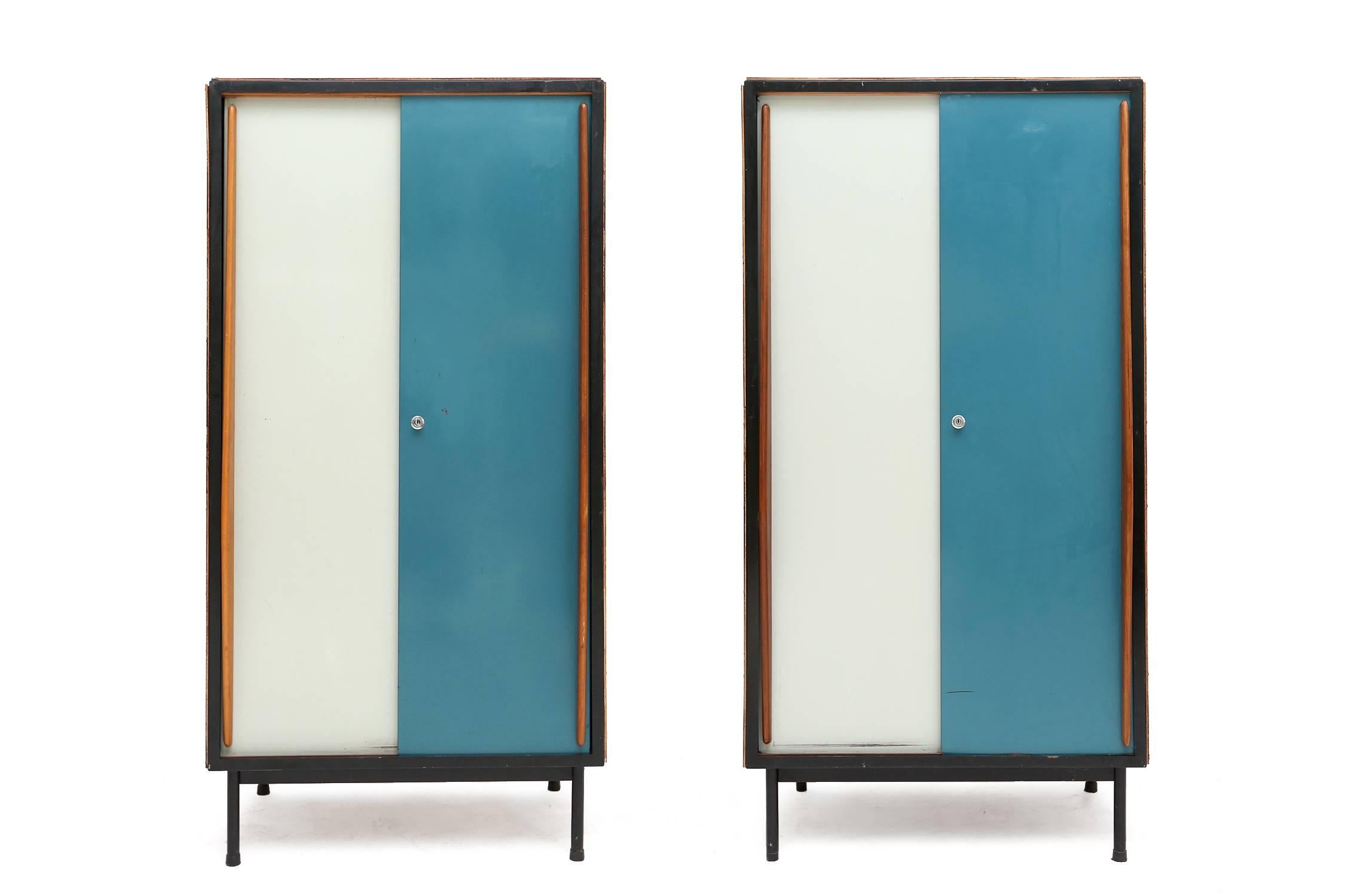 Great pair of storage / wardrobe pieces metal frame and doors
sapelli veneered wooden sides and top.
Willy Van Der Meeren for Tubax,
Belgium, circa 1950.
Would look great in any modernist home, interior or office.
Measures: H 160 cm W 81 cm D