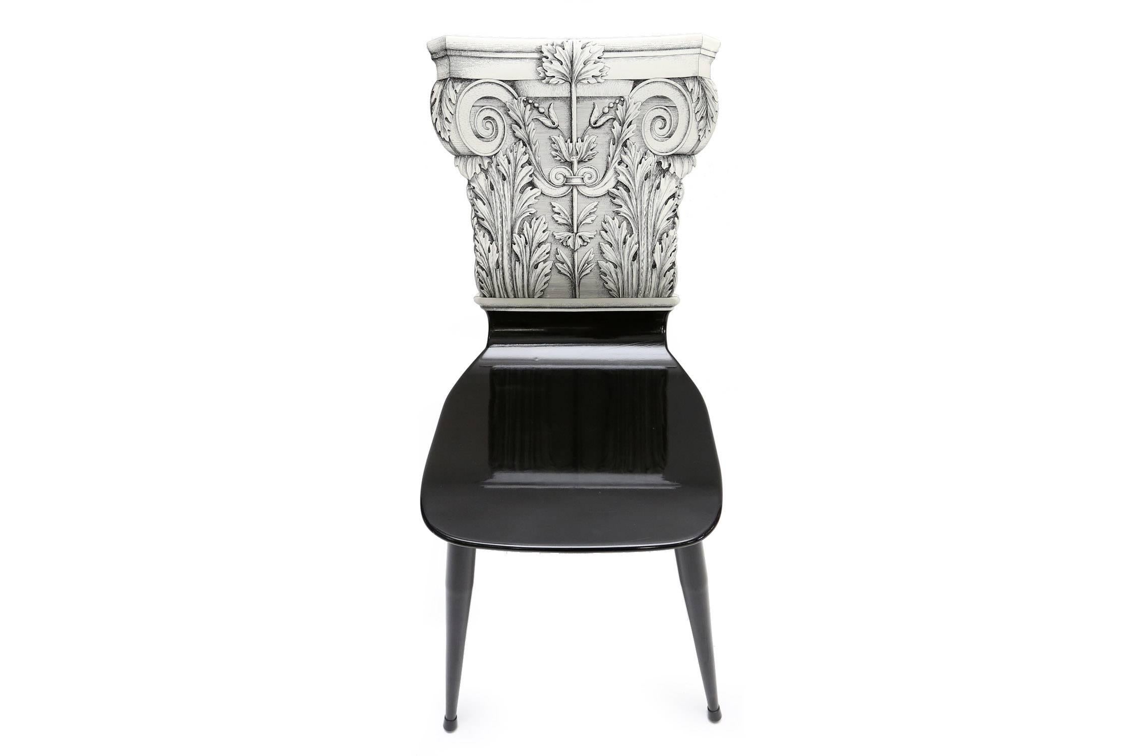 Original Fornasetti chair confirmed by Barnaba Fornasetti.
Model “Capitello corinzio”, made by his father in the 1980s.
Lithographically printed on lacquered wood.
Measures: H 91 cm, D 54 cm, L 41 cm, SH 42 cm.
 