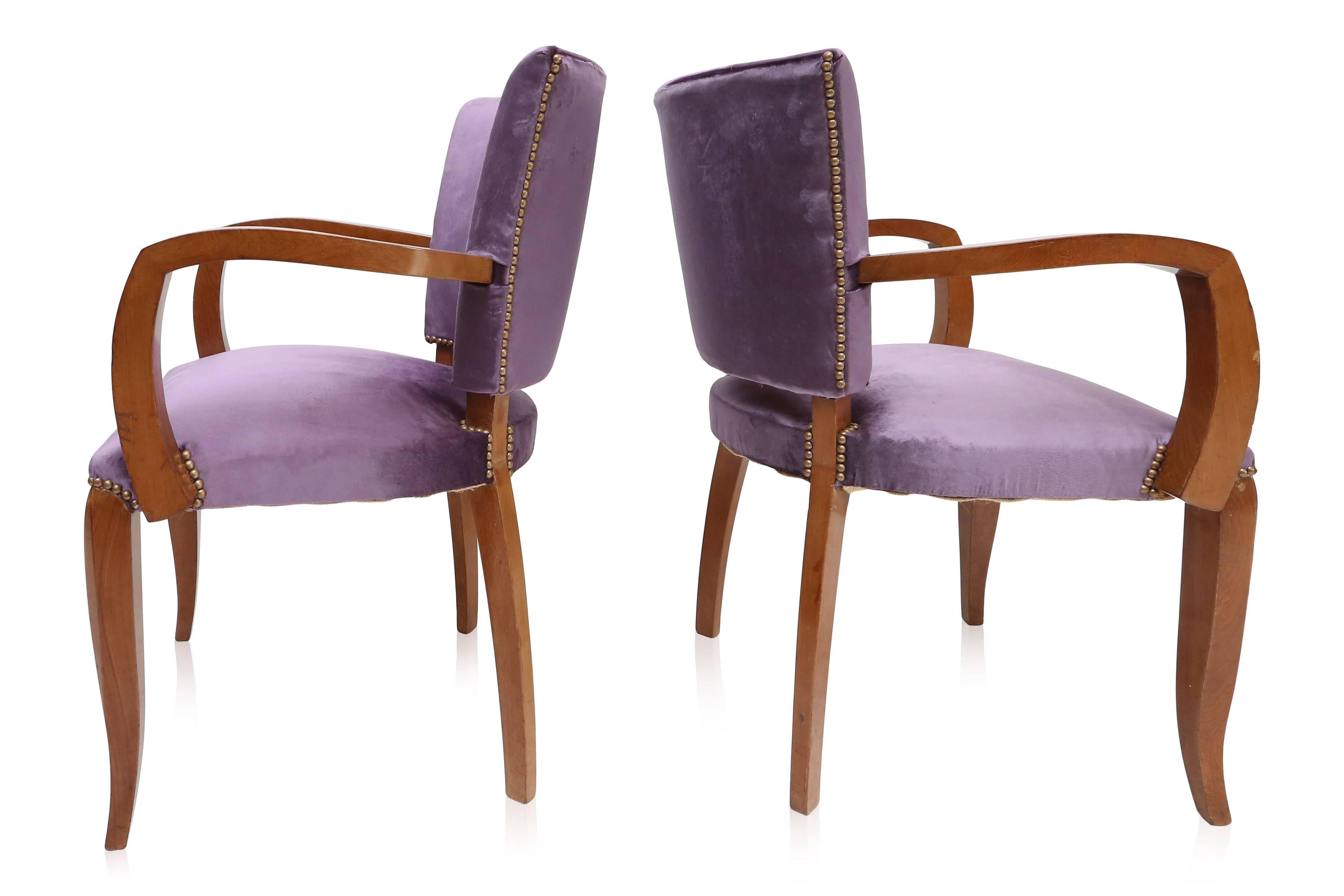 Luxurious pair of Art Deco armchairs, 
A solid mahogany frame and lilac velvet upholstery make these a perfect set to be used at a desk or as corner table chairs
designed by the interior designer and architect Charles Van Beerleire in Ghent,