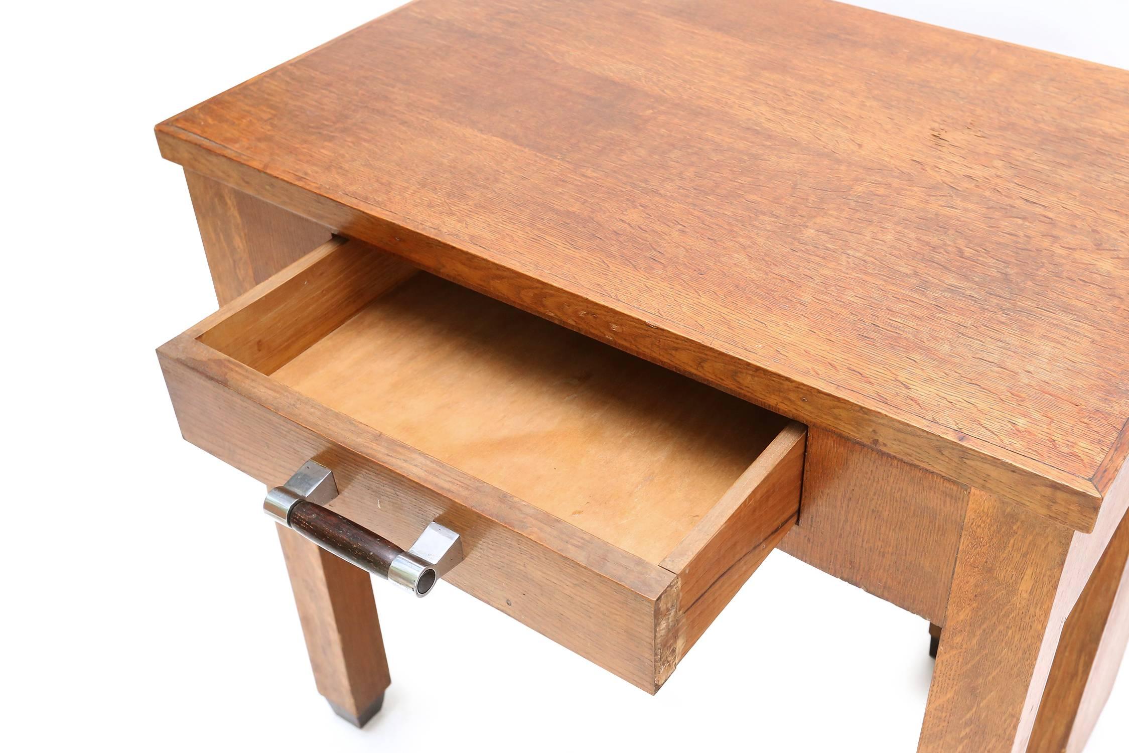 This Minimalist early 20th century (1910) desk comes from the era of the first modern designs with straight lines.