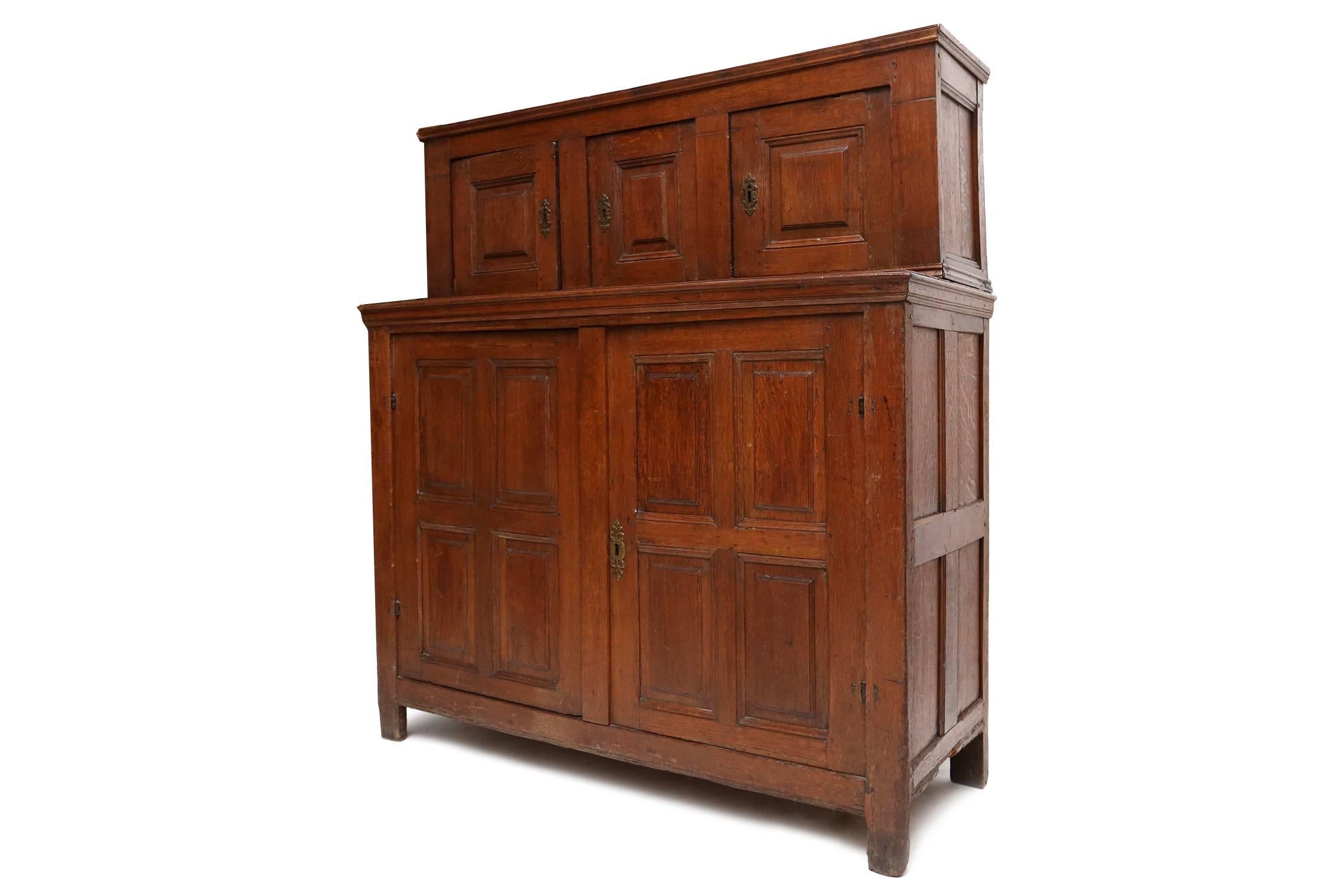 Solid oak cabinet - meuble deux corps, France, circa 1780
real minimalistic type of antique furniture
suits well in an antique inspired or eclectic kind of interior 
Measures: H 157 cm, D 55 cm, L 142 cm.
Check out our Goldwood storefront for more