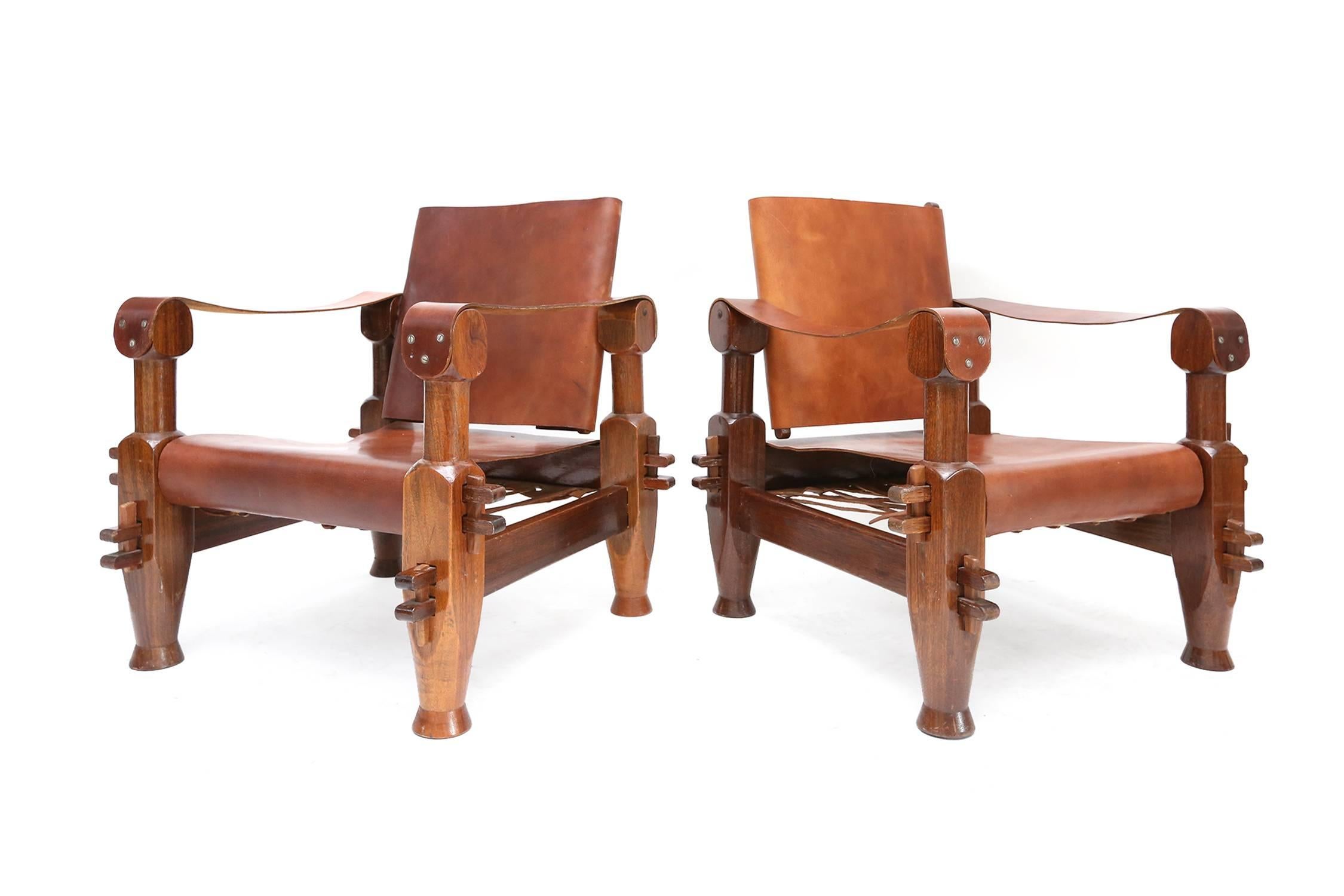 Stunning set of safari lounge chairs,
Mid-Century Modern, 1960s.
More masculine and brutal in style than their Danish cousins.
H 77 cm W 72.5 cm D 72.5 cm SH 36 cm.
  
