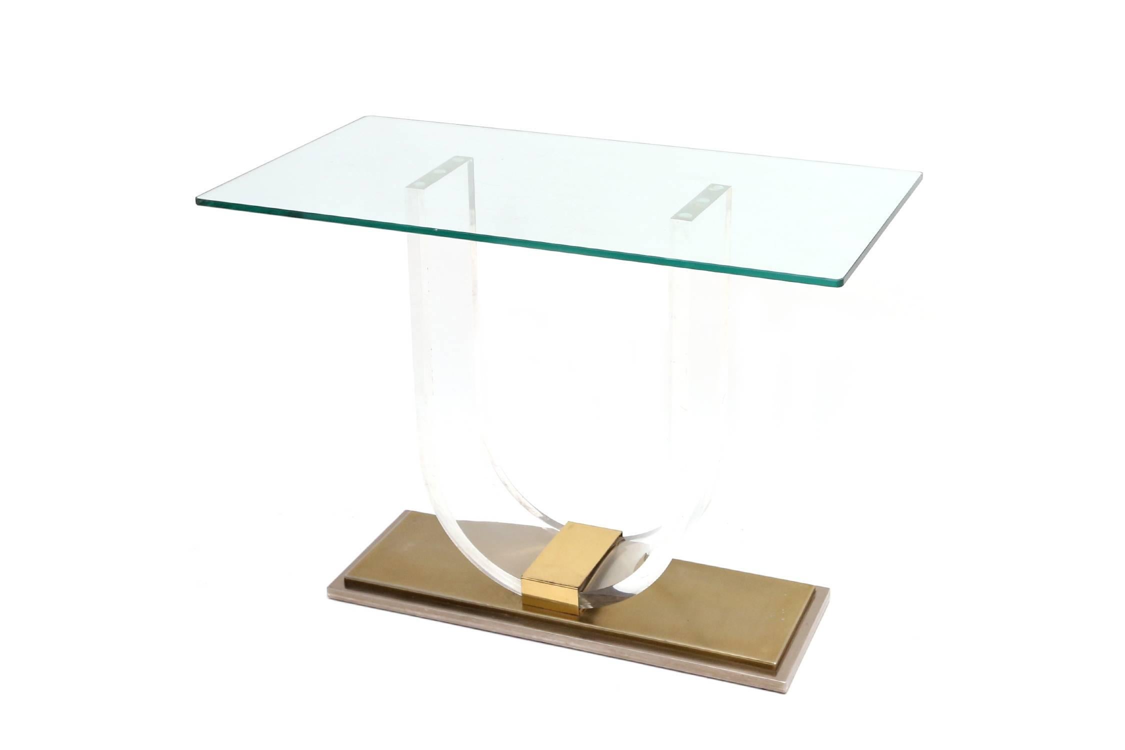 Perspex and brass console table.
In the shape of "U".
Belgochrom, Maison Jansen, 1970s.
Measures: L 100 cm, H 72 cm, D 50 cm.

 