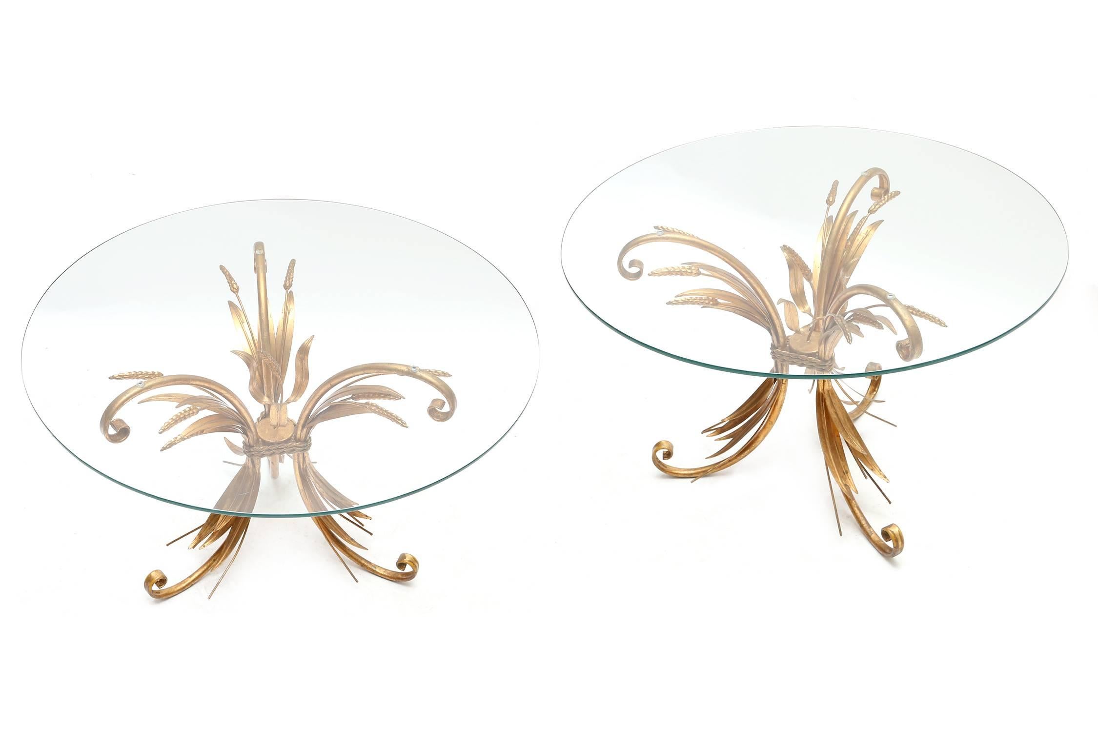 Pair of Coco Chanel side tables,
gilt wheat sheaf.
France, 1970s.
Measures: Ø 80 cm H 50 cm.

          
