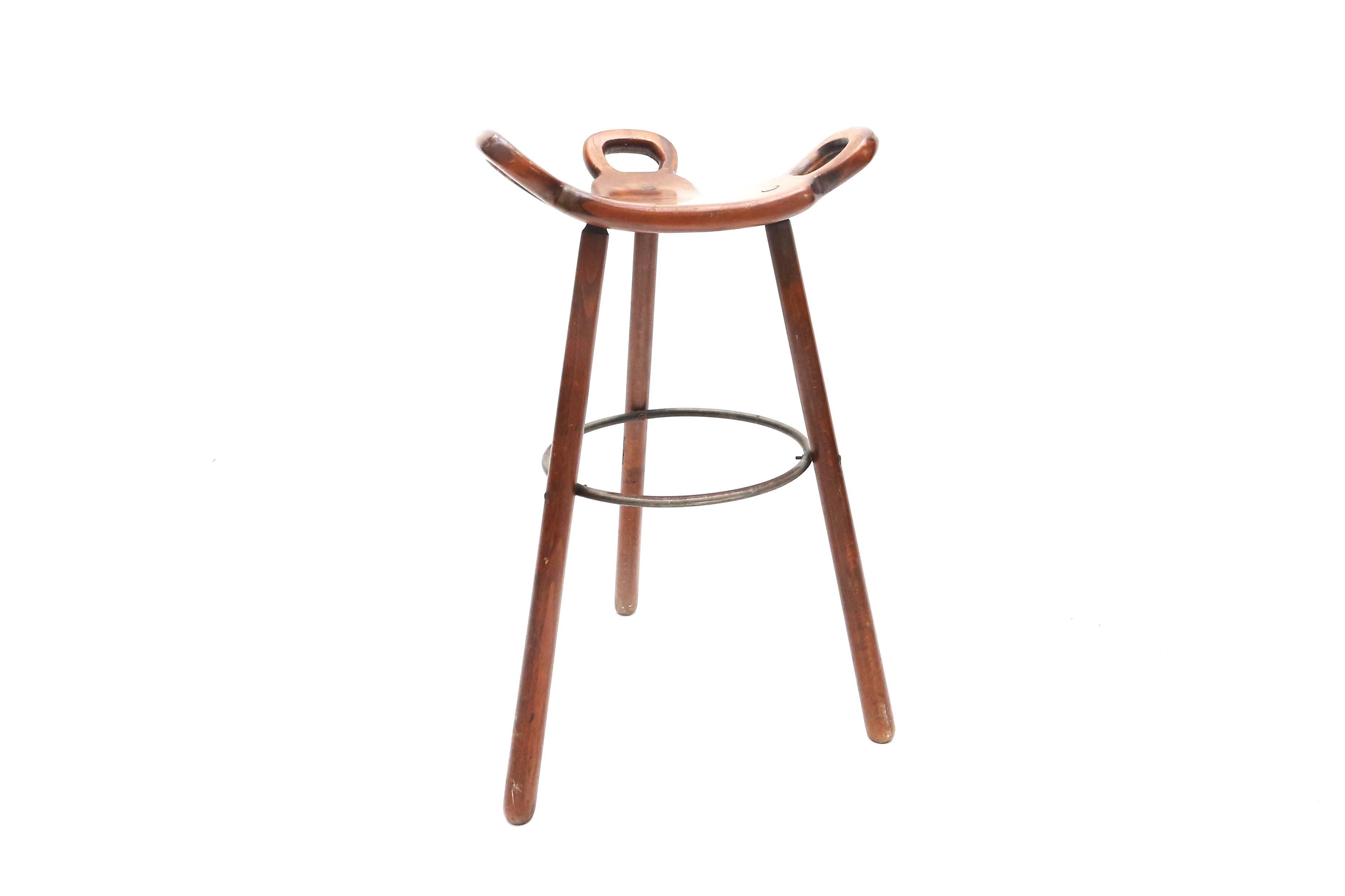 Set of four bar stools attributed to Carl Malmsten. 

These stools are made of solid beechwood, lacquered steel and beautiful connections to fix the seat. The stools are in original condition with nice patina from age and usage.

Sweden, 1950.