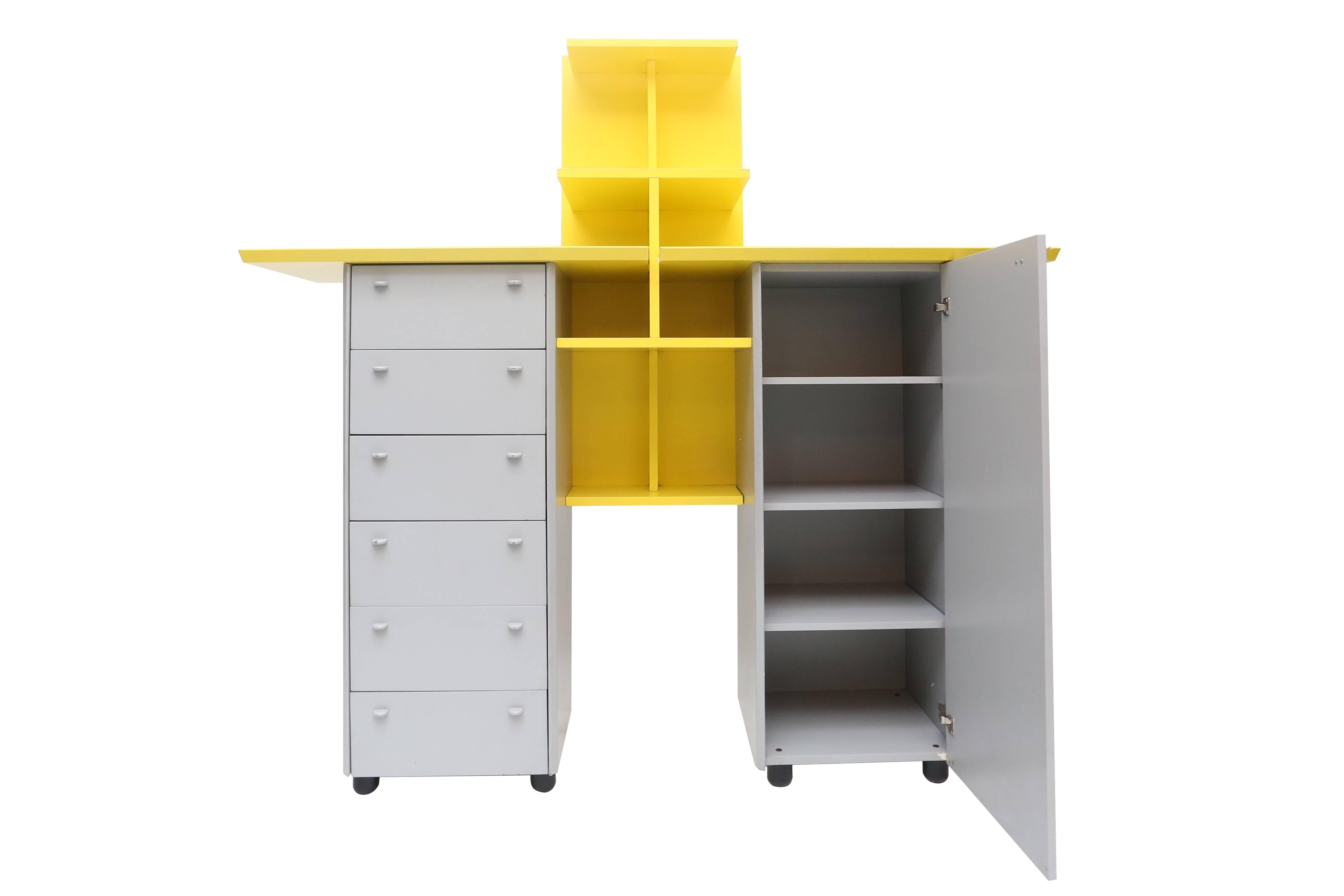 Postmodern yellow and grey 1980s storage cabinet, 
Memphis inspired custom design by Dutch Architect in laminated wood.

Measures: D 46 cm, H 185 cm, W 182 cm.