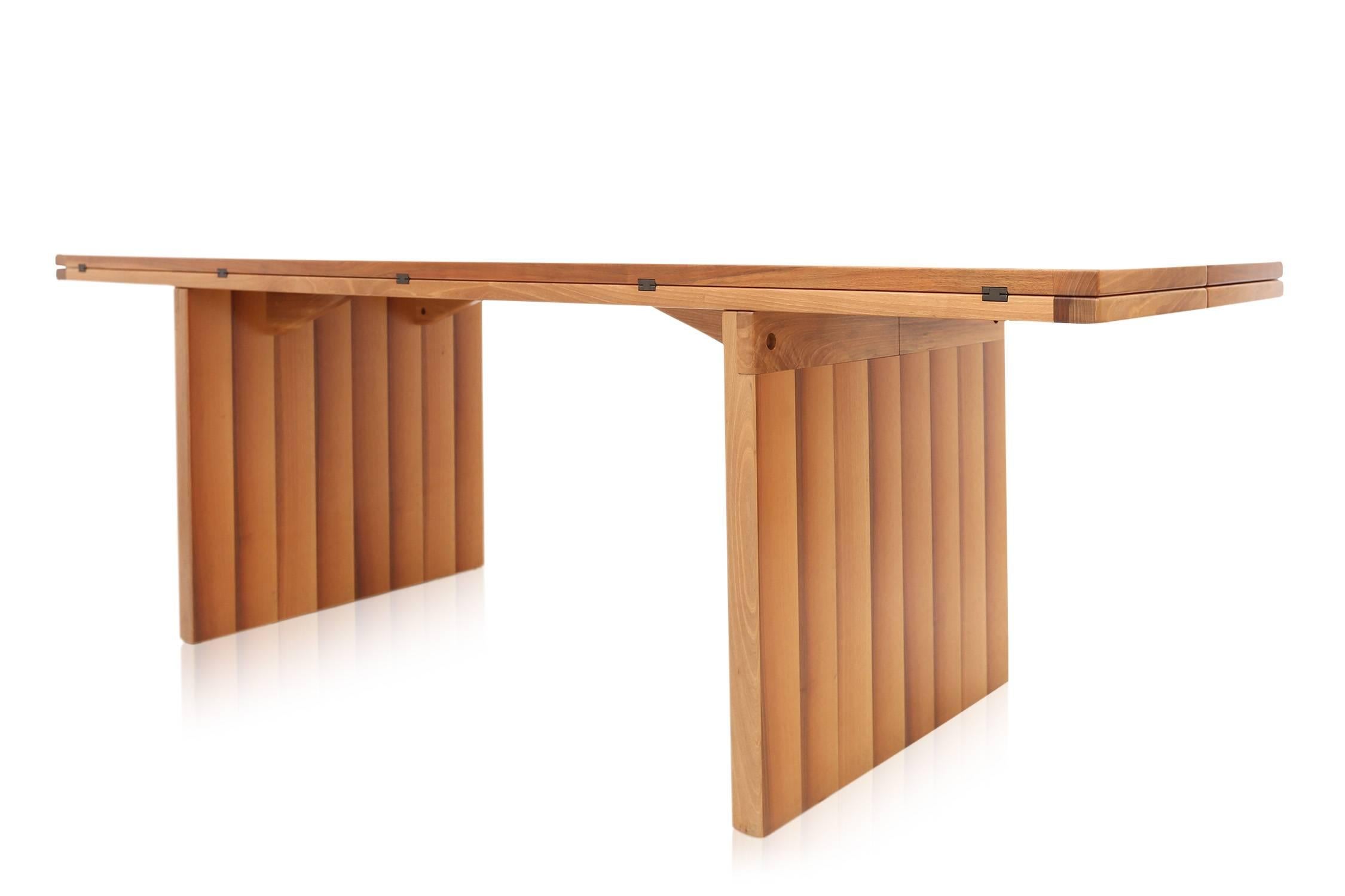 Rectangular table with extending top.
A limited edition version. Model 'La Barca', meaning 'the boat'

by Piero De Martini for Cassina in 1975.

Measures: D 148 cm / 74 cm L 225 cm H 74 cm

 