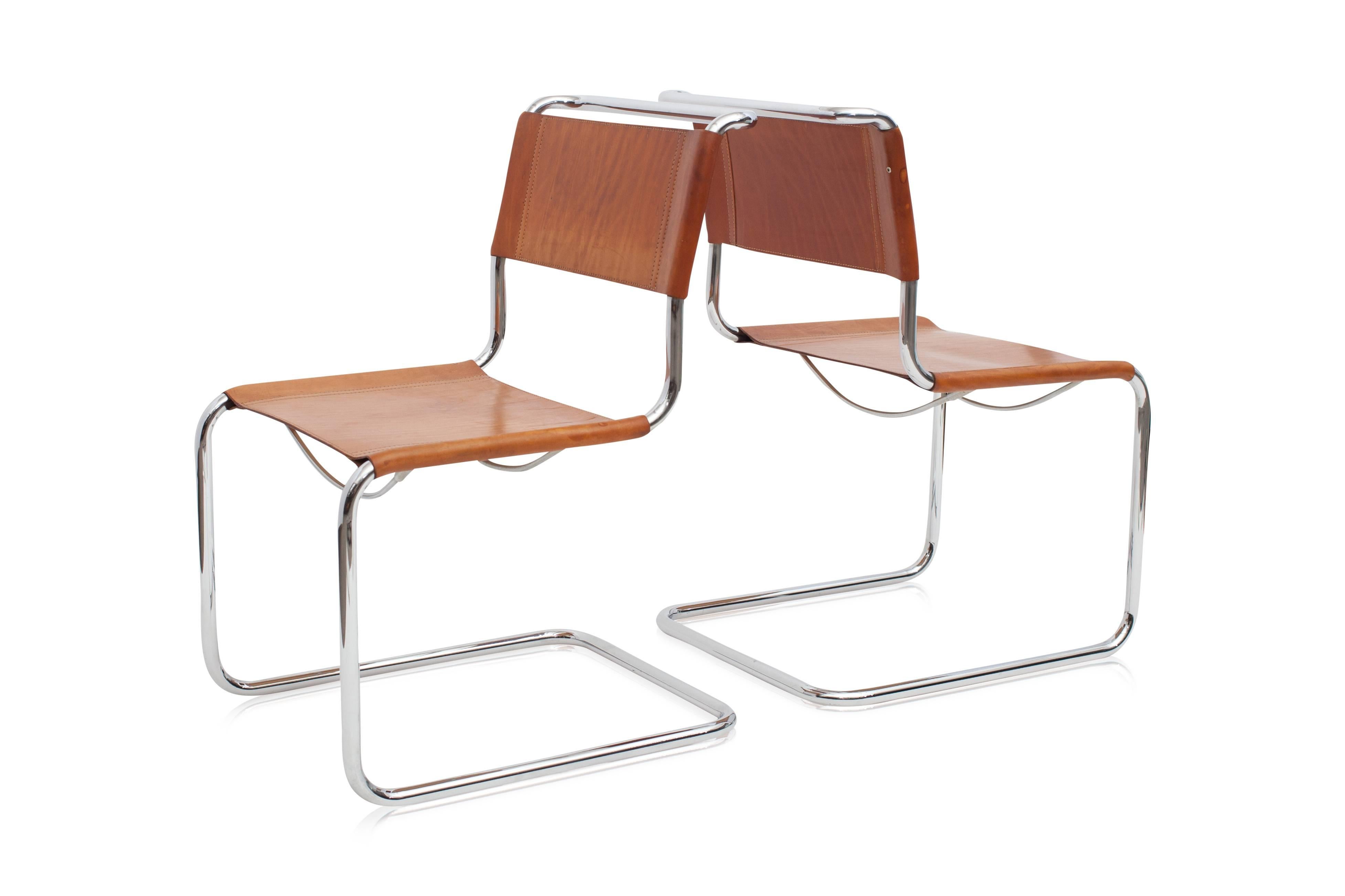 Tubular chromed steel cantilever dining chairs with cognac leather seating
in the manner of Marcel Breuer
nice patina on the leather only acquired by age

Italy, 1970s

Measures: W 53, D 59, H 86.5, SH 42.5 cm.

 