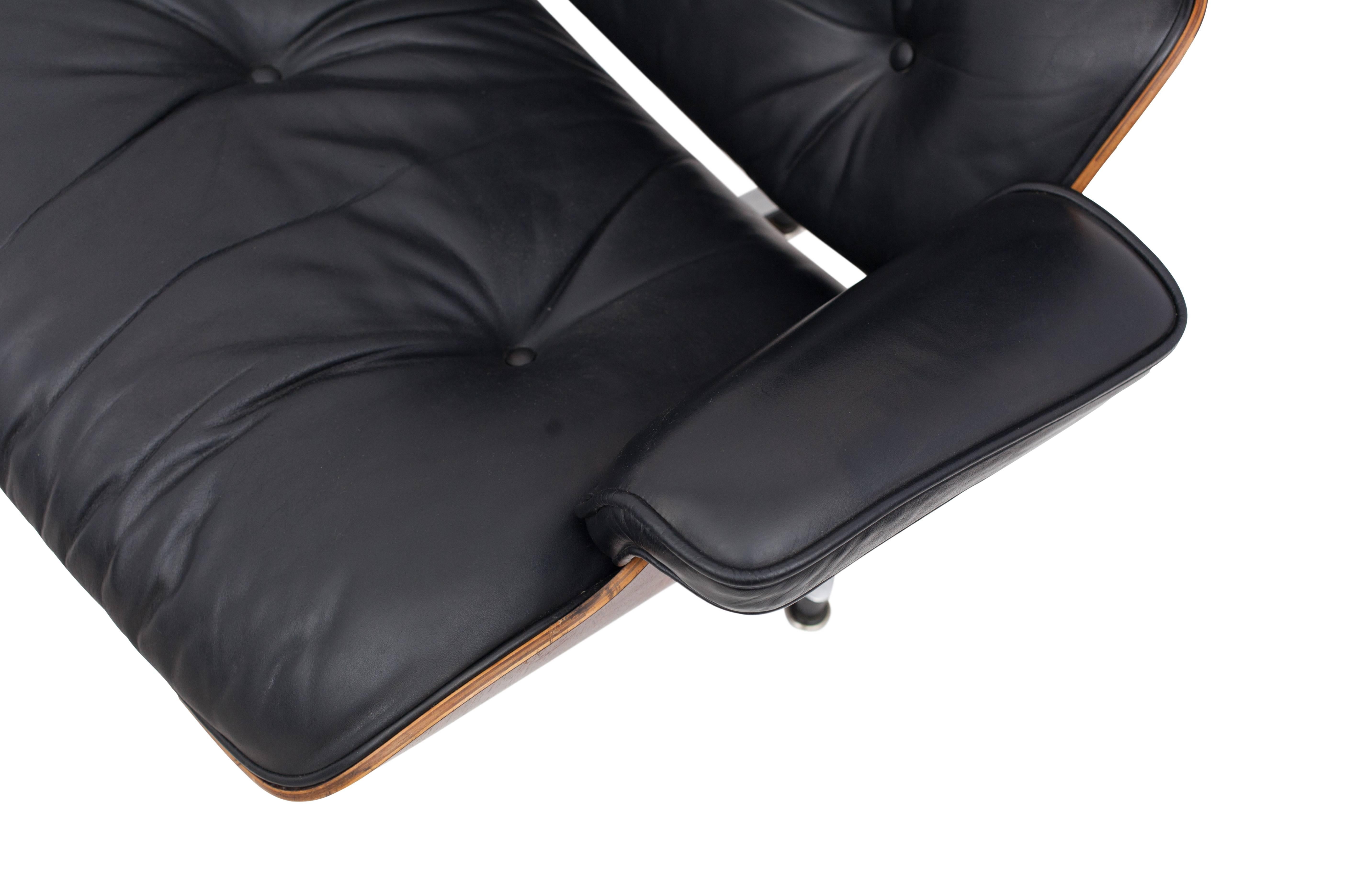 Steel Eames Black Leather and Rio Rosewood Lounge Chair and Ottoman