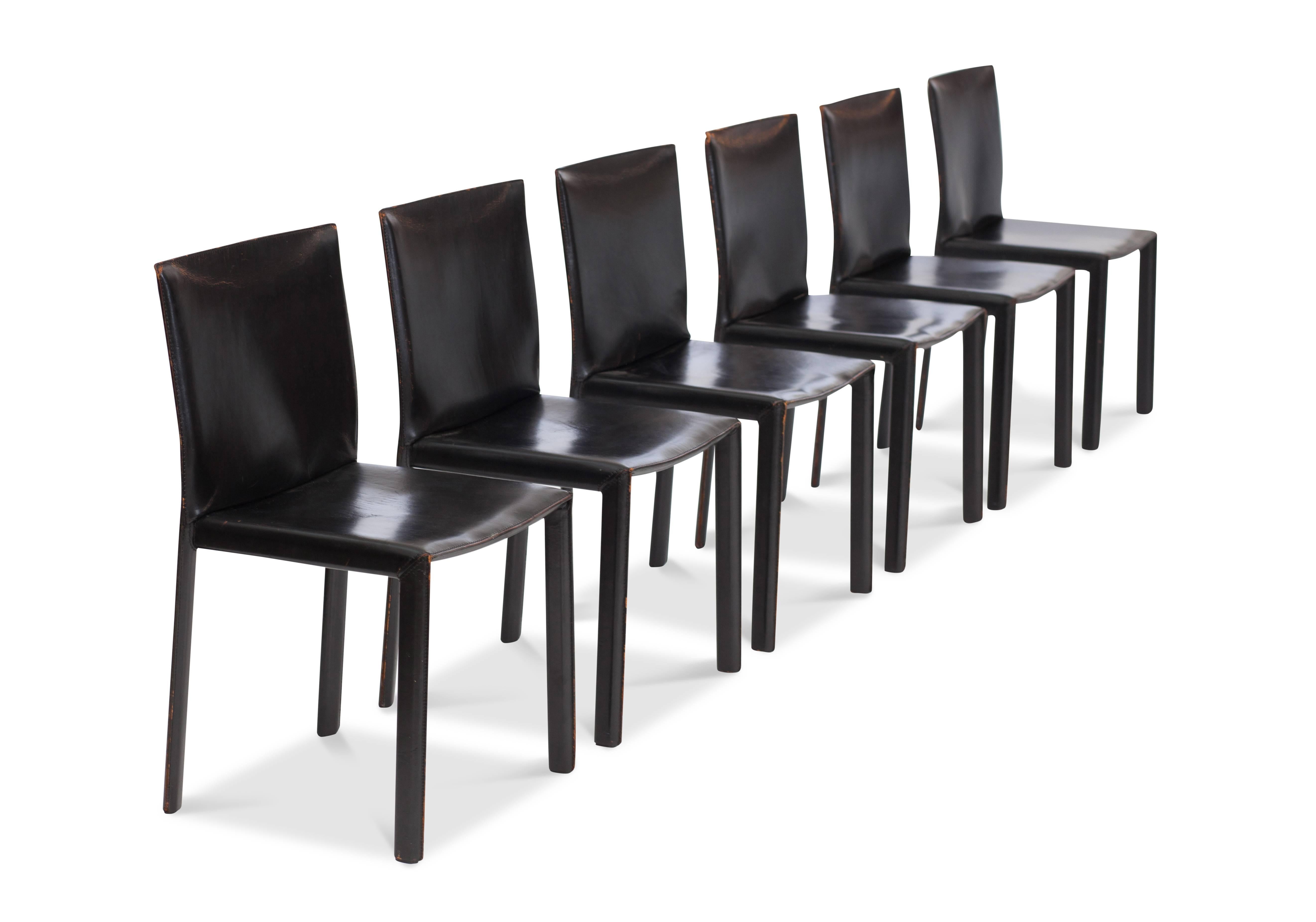 Postmodern Black full grain leather dining chairs
by studio Grassi & Bianchi for Pellizoni, Italy, 1980s

Inspired by the works of Mario Bellini and the CAB chair

Nice wear and great vintage condition.

Measures: H 81 cm, W 43.5 cm, D 42 cm, SH