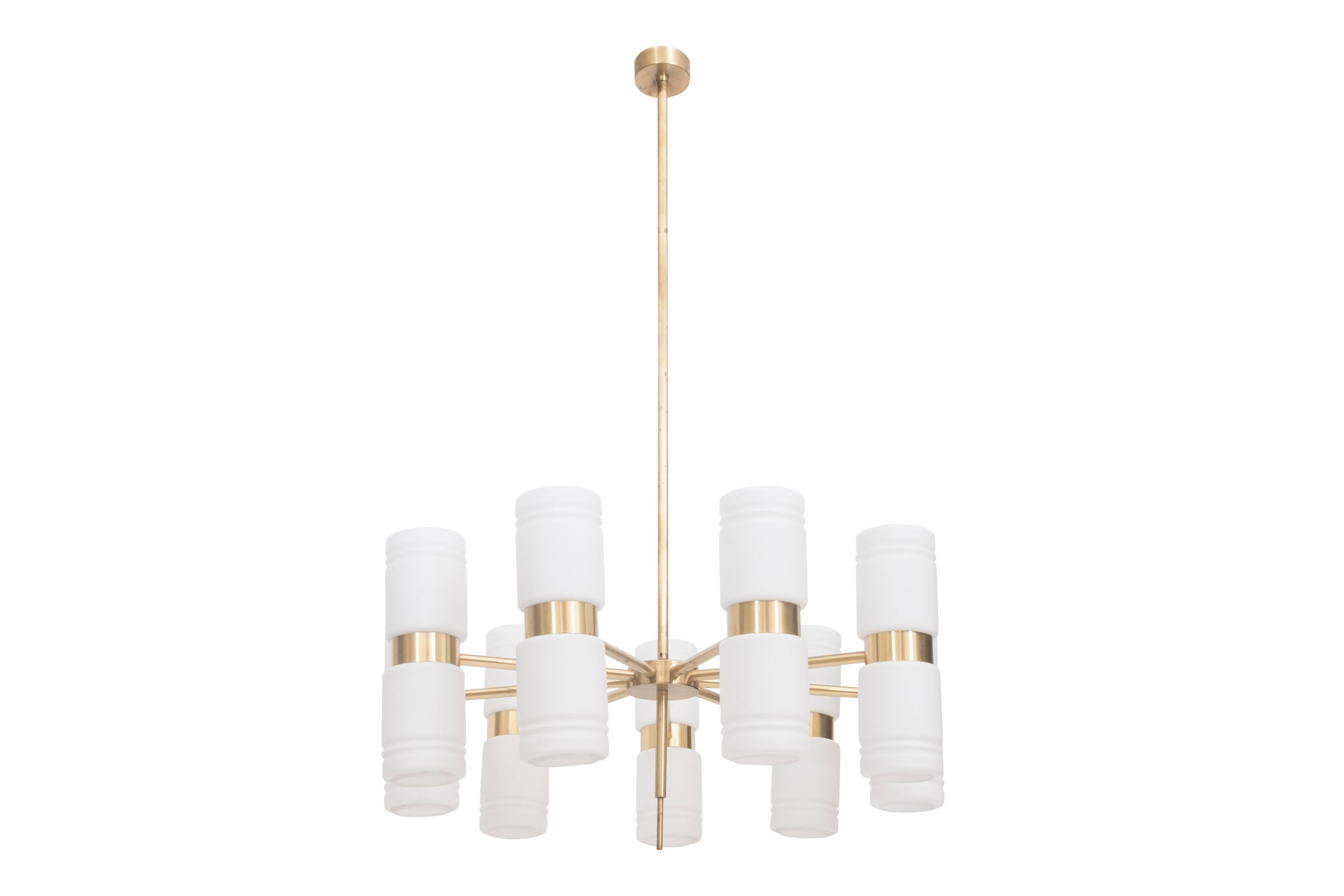 Midcentury brass and milky opaline glass chandelier by Hans Agne Jakobsson

We have 10 of these huge chandeliers available

They origin from the Musis Sacrum concert hall
We have a matching set of wall sconces in another listing

The opaline