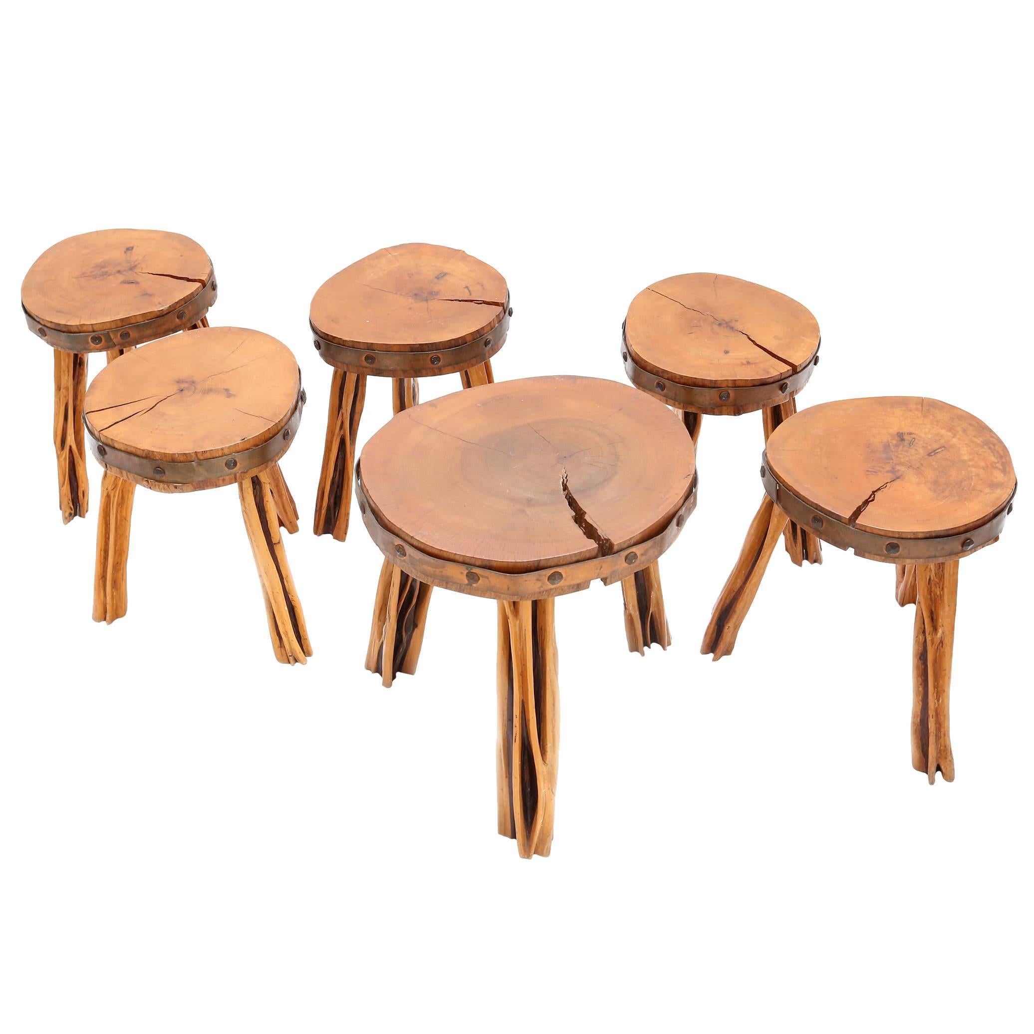 A most unusual set of stools with beautiful copper details, 

France, 1960s.

Solid wood - copper.

The biggest stool measures Ø 40 cm H 45 cm.