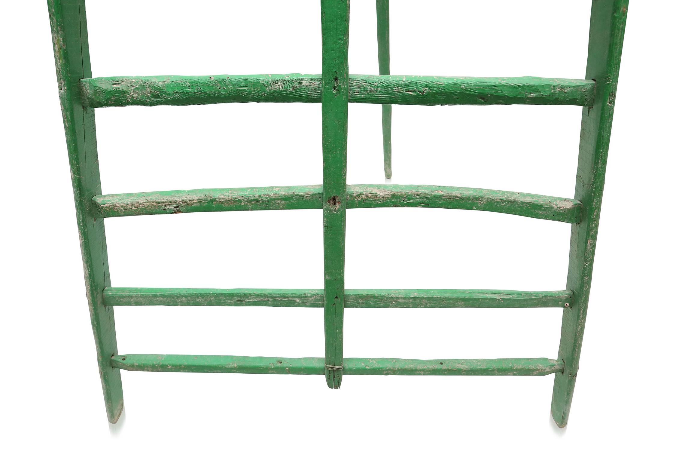 green lacquered fruit ladder,
France, 19th century,

'objet trouve´.'

Measures: H 293 cm W 146 cm.
  