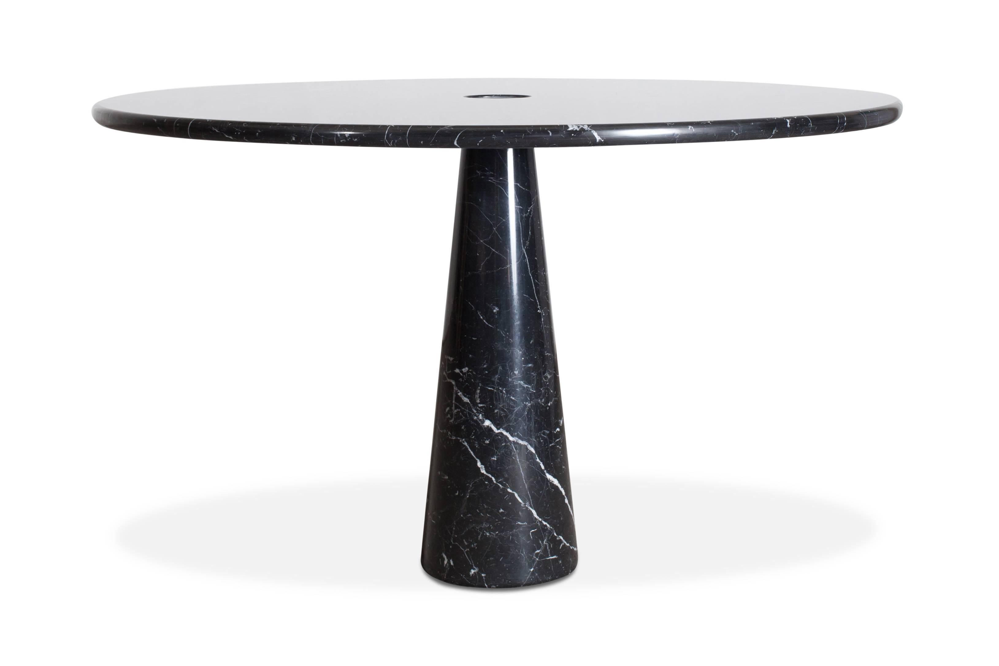 Angelo Mangiarotti black marble dining table - Model: 'Eros'

Designed in 1971 in Italy. Elegant and sculptural piece.
Beautiful white veins running through the black marble.

 