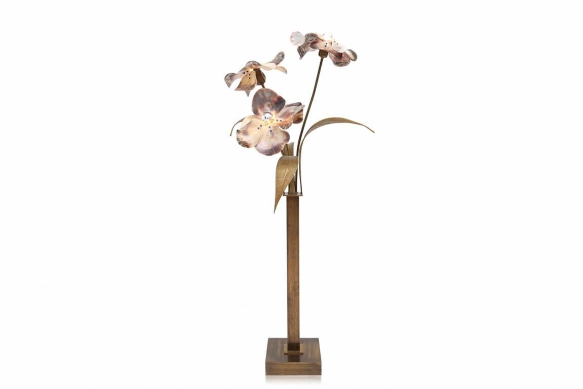 Hollywood Regency; Mother-of-Pearl; Bronze Floral Floor Lamp; Willy Daro; 

Willy Daro designed this elegant floor lamp in Belgium in the 1970s. The lamp has three bronze stems, with stunning floral designs. The leaves are in mother-of-pearl, all