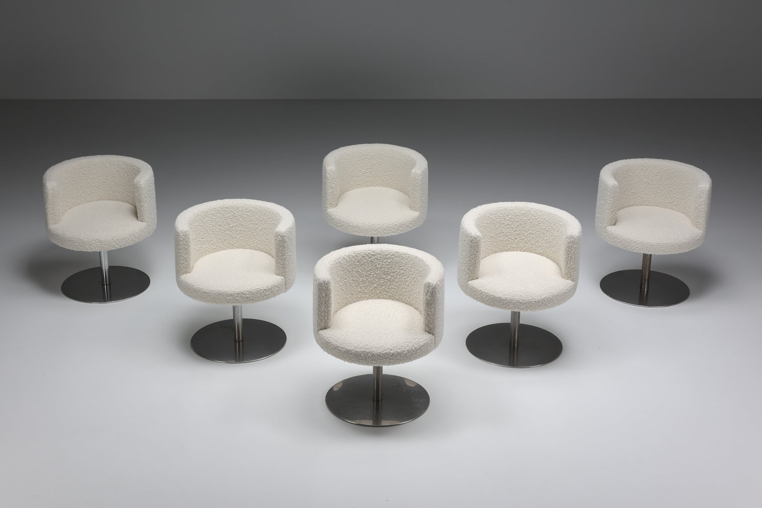 1960's; Italy; Mid-Century Modern; Italian Design; Formanova; Gianni Moscatelli; Dining chair set; 

Gianni Moscatelli Money Swivel Chairs for Formanova, made in the 1960s in Italy. Set of seven dining chairs all newly upholstered in white boucle