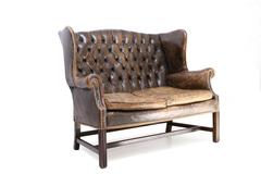Chesterfield wingback tufted leather sofa