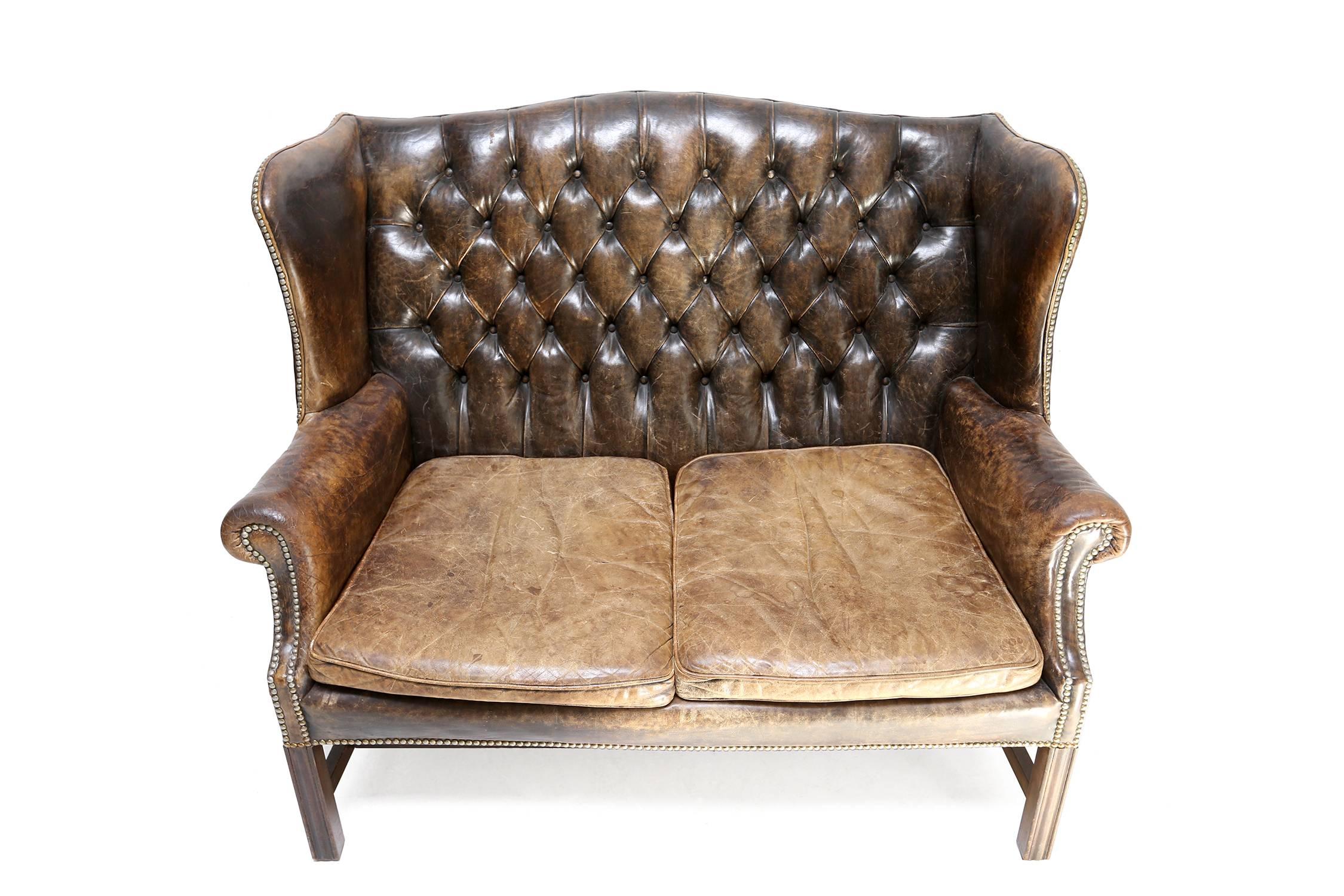 Chesterfield wingback tufted leather sofa 1