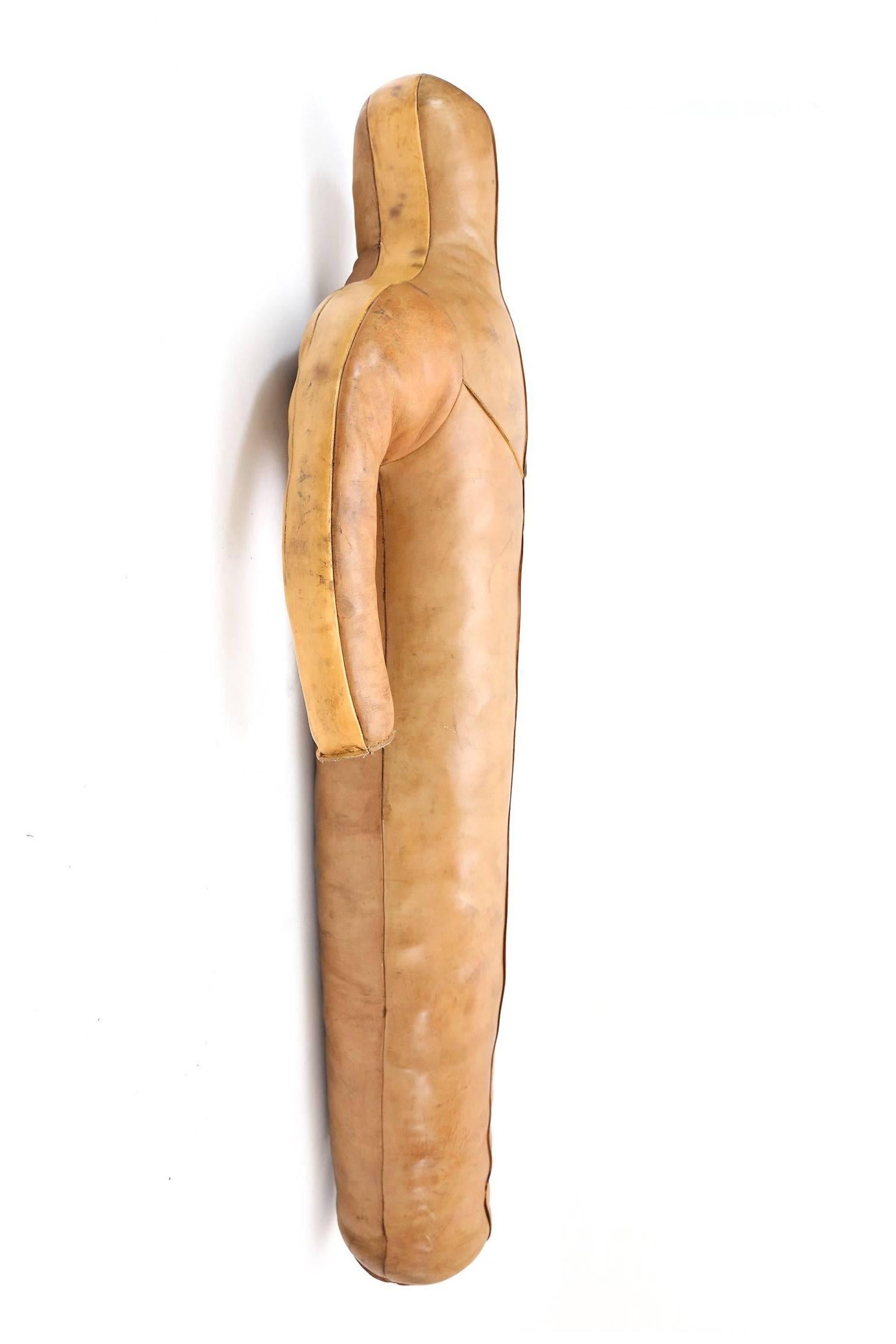 Decorative Stuffed life size leather doll
used in the early 20th century for boxing exercise,
Americana.
Measures: H 156 cm, L 70 cm, D 30 cm.
               