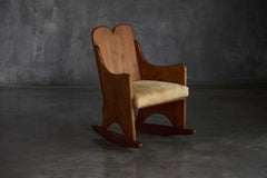 Fauteuil à bascule en bois dans le style d'Axel Einar Hjorth – années 1930