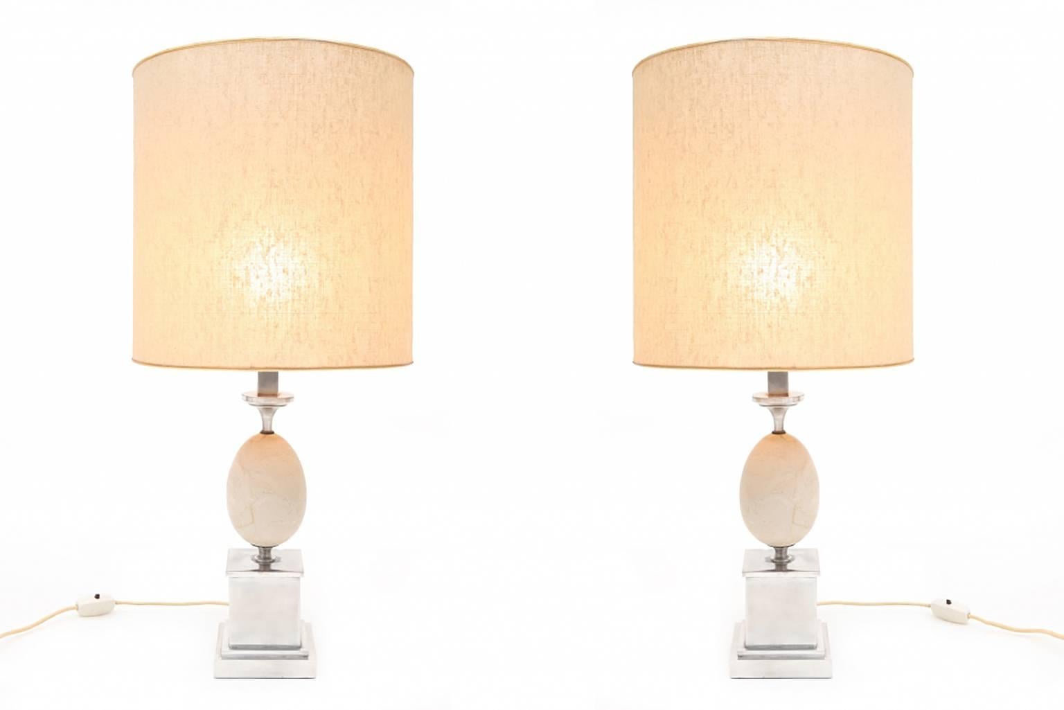 Travertine; Chrome; Lamps: Table lamp: Hollywood Regency; France; 1970's;

Hollywood Regency pair of travertine & chrome table lamps.

Check out our Goldwood storefront for more matching pieces.