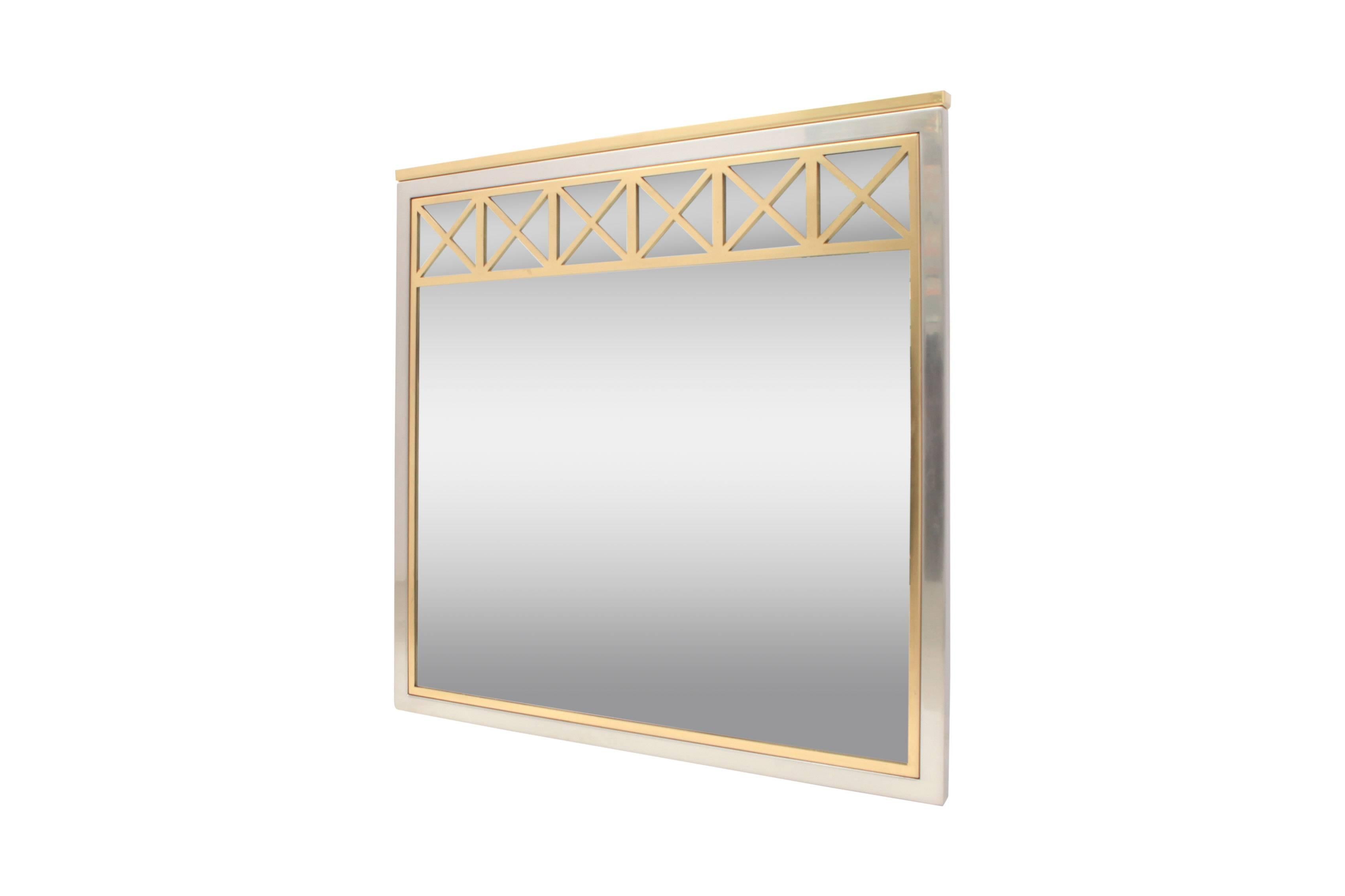 Mid-Century Modern brass and chrome mirror.
Attributed to Maison Jansen, France, 1970.

Excellent high-end design in mint condition.

Measures: W 88 x H 91 x D 4 cm.