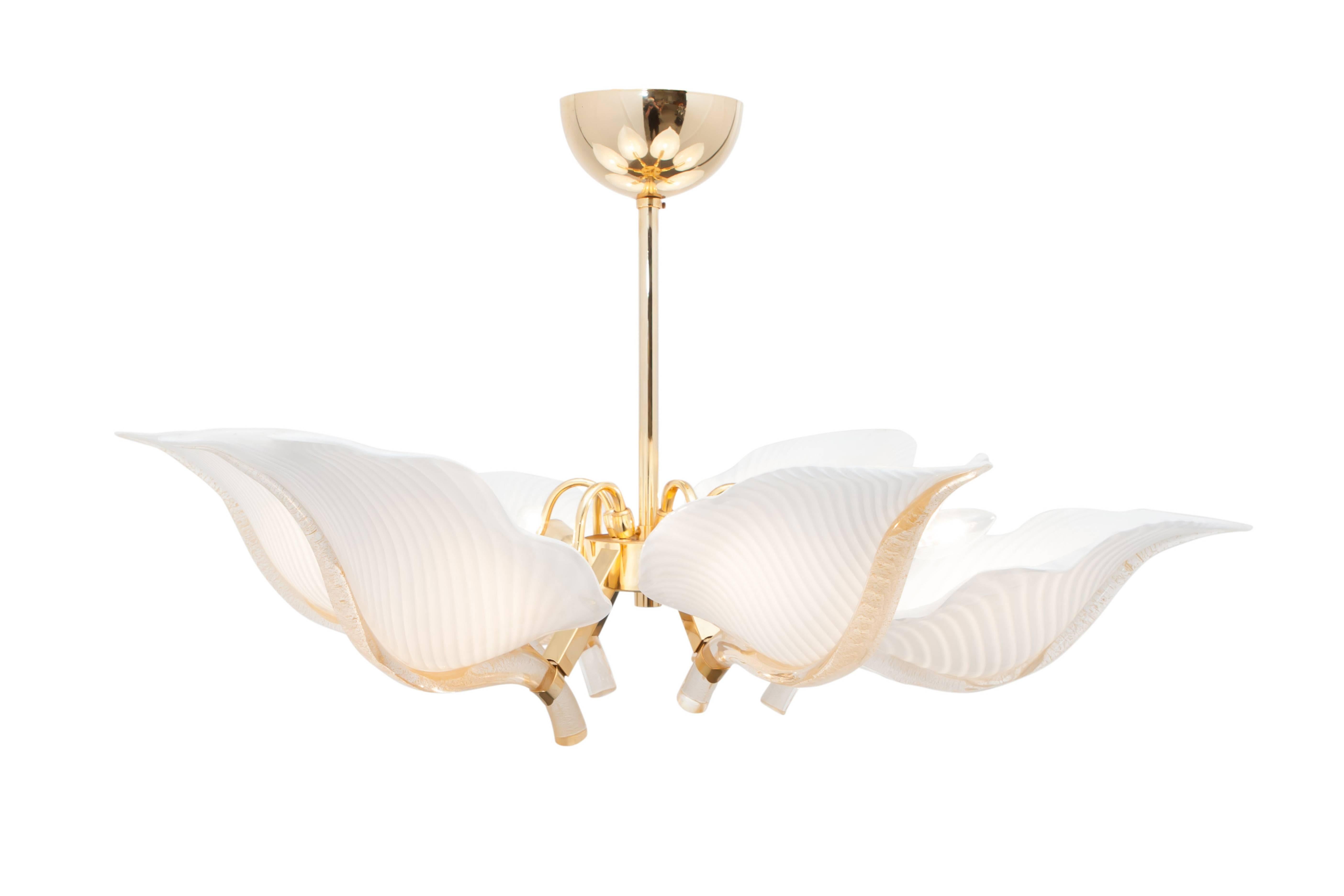 1970s chic chandelier with handblown glass leaves.
Brass frame.
By Franco Luce, Italy.
Measures: Ø 90 cm, H 75 cm.