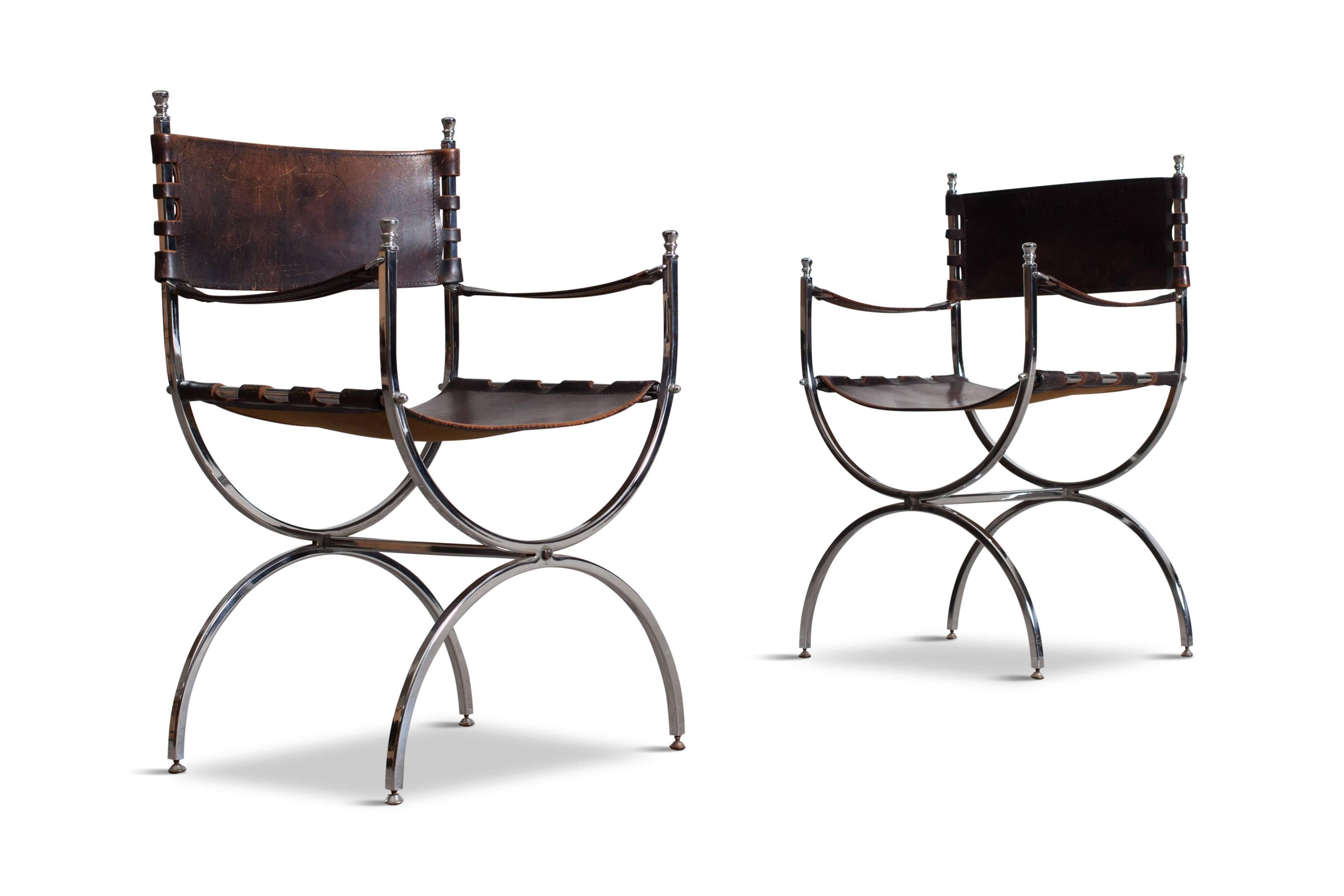 Set of four “Savonarola” Emperor chairs by Maison Jansen, 1970s

Stunning set of four Maison Jansen armchairs consisting of chrome squire tubular frames
and beautifully patinated thick brown leather, seats, back and armrests.

Produced in