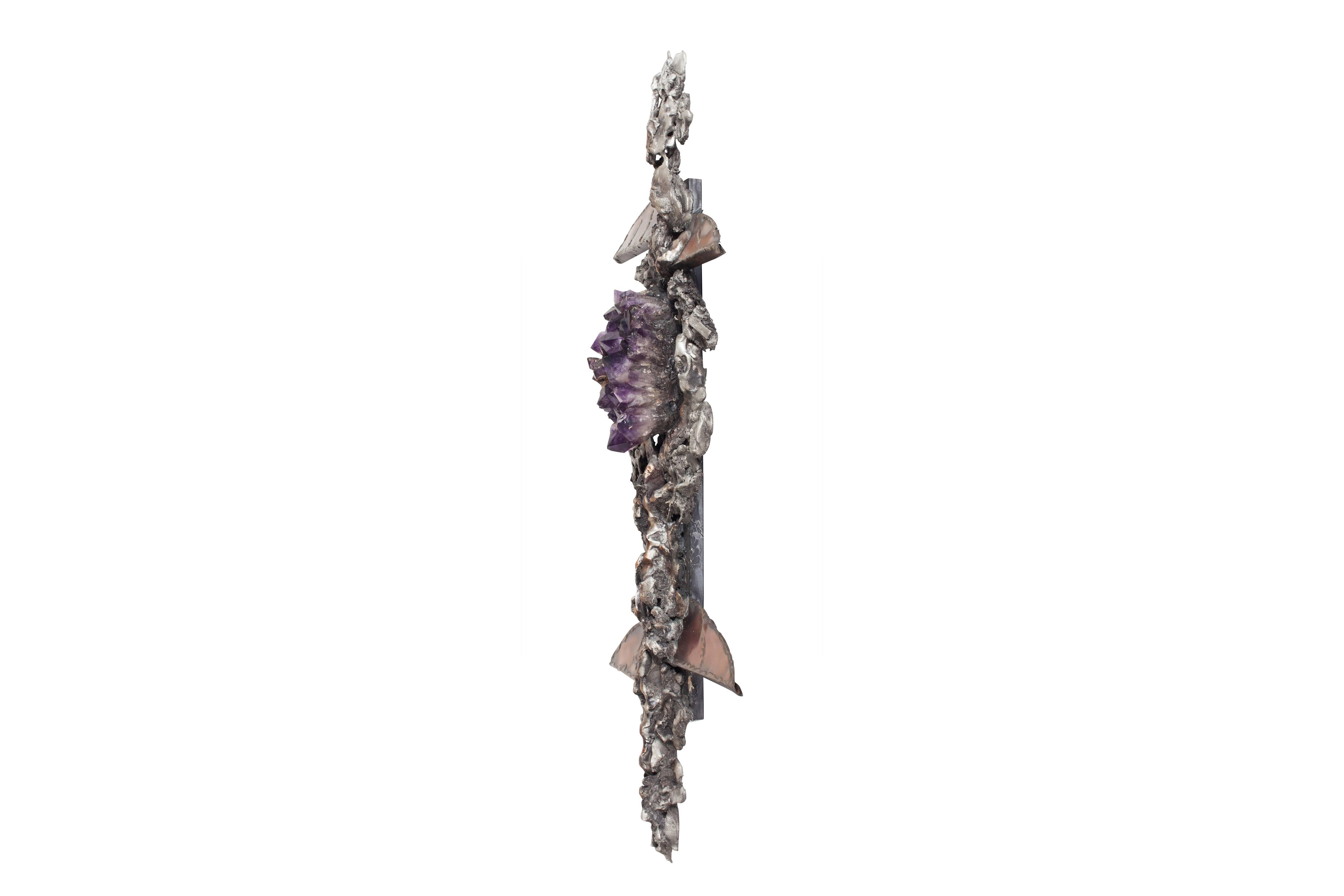 Hollywood regency Large and decorative wall-sculpture by Belgium designer Marc D’haenens, 1970s.

The piece shows a variation of organic shapes in metal and copper, and a large piece of Amethyst as
centrepiece.