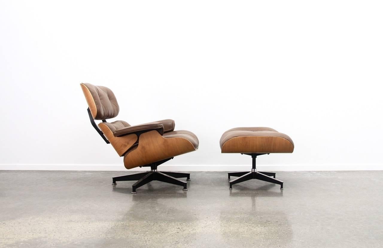 The well-known Eames lounge chair and ottoman for Herman Miller, USA, 1970s
A great combination of original brown leather in great condition and a walnut veneer.

 