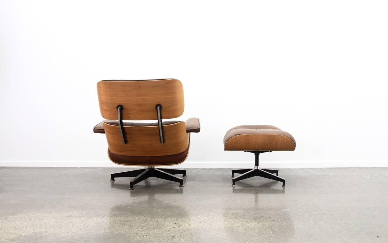 Mid-Century Modern Eames Lounge Chair and Ottoman in Walnut and Brown Leather, 1970s