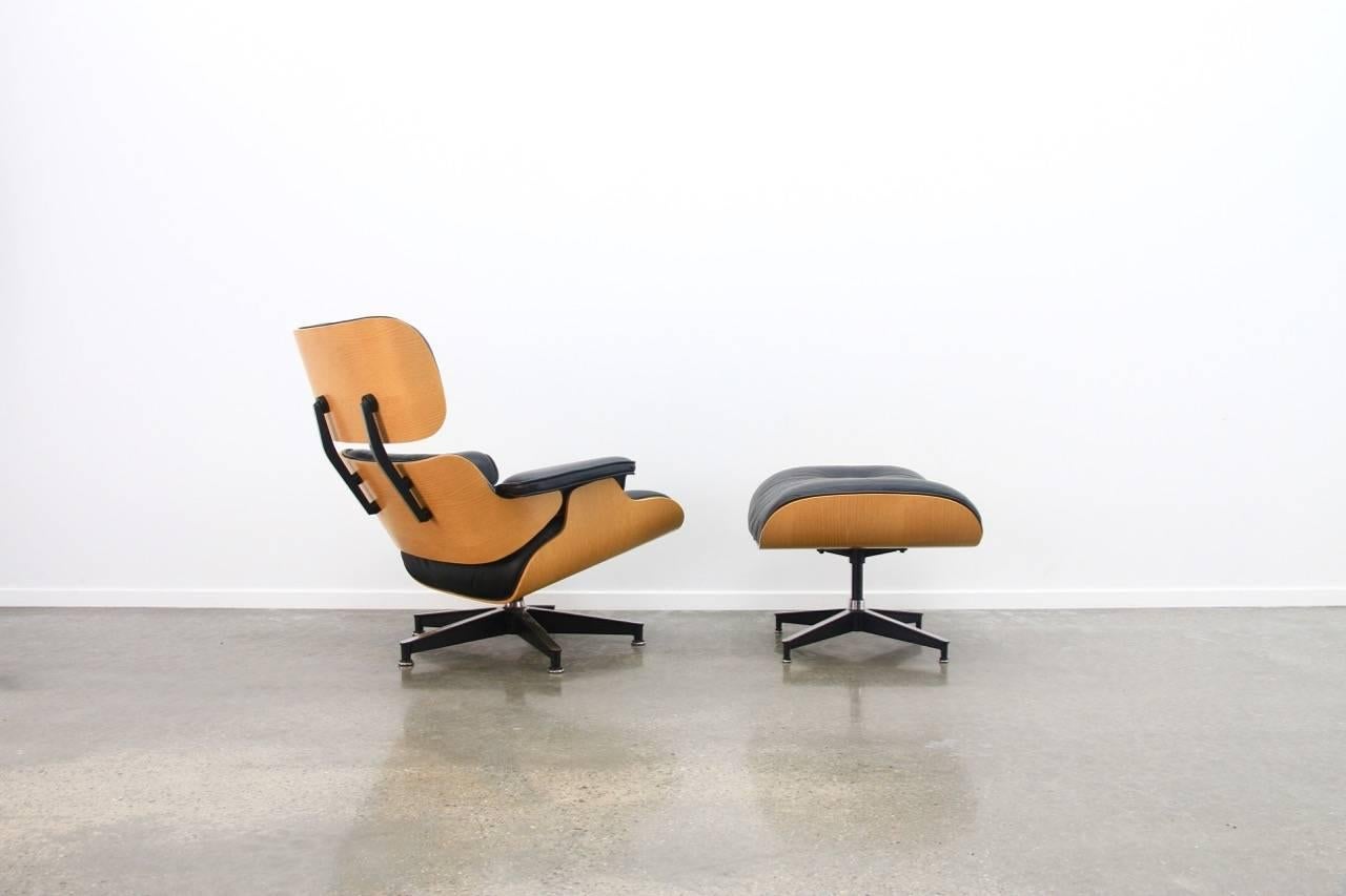 Metal Eames Lounge Chair and Ottoman in Oak Veneer and Brown Leather, 1970s