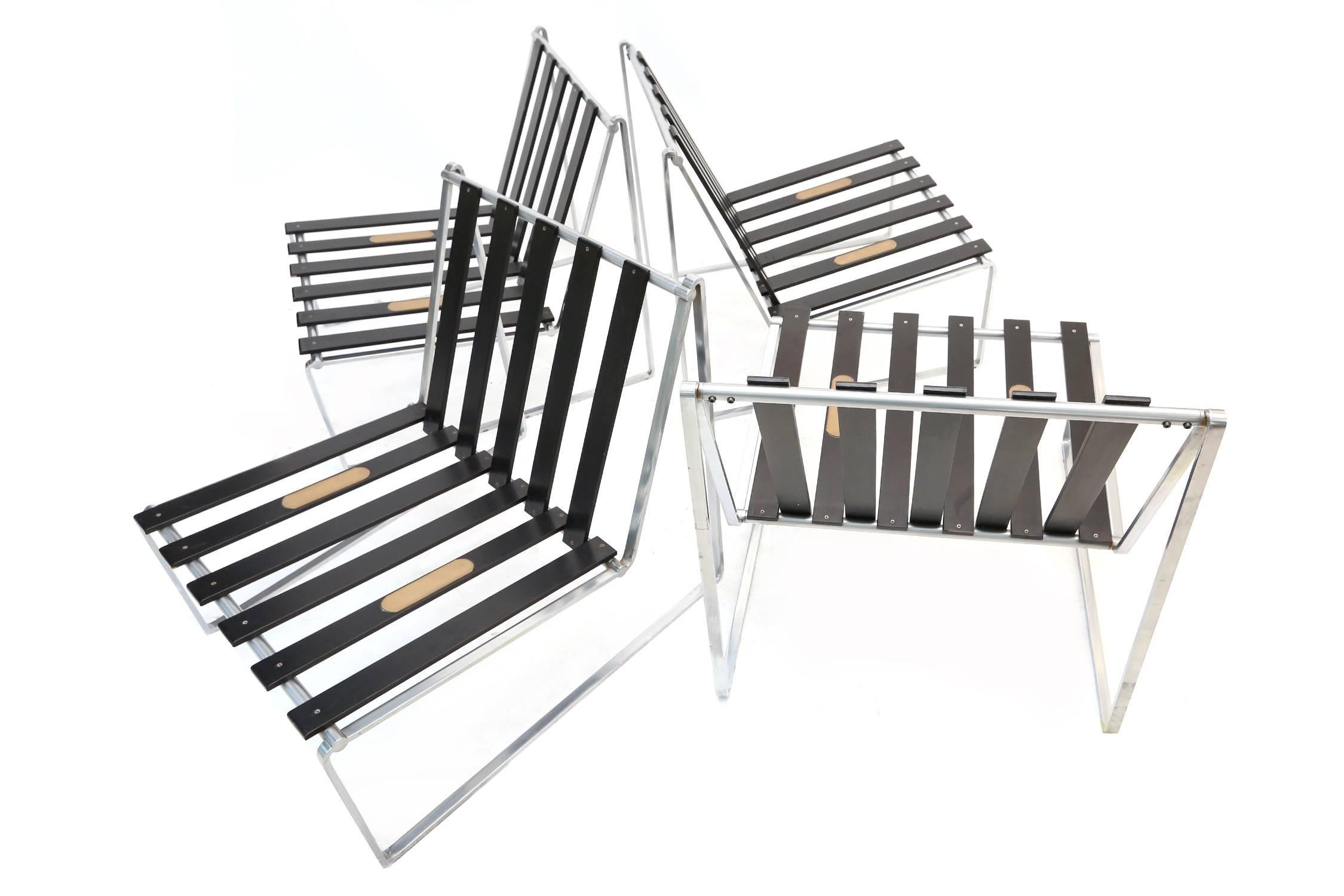 Set of two chromed steel and lacquered wood easy chairs.
Kho Liang Le for Artifort, series 024,
Netherlands, 1962.

Measures: H 66 cm, W 72 cm, D 65 cm.

Two pairs available.
     