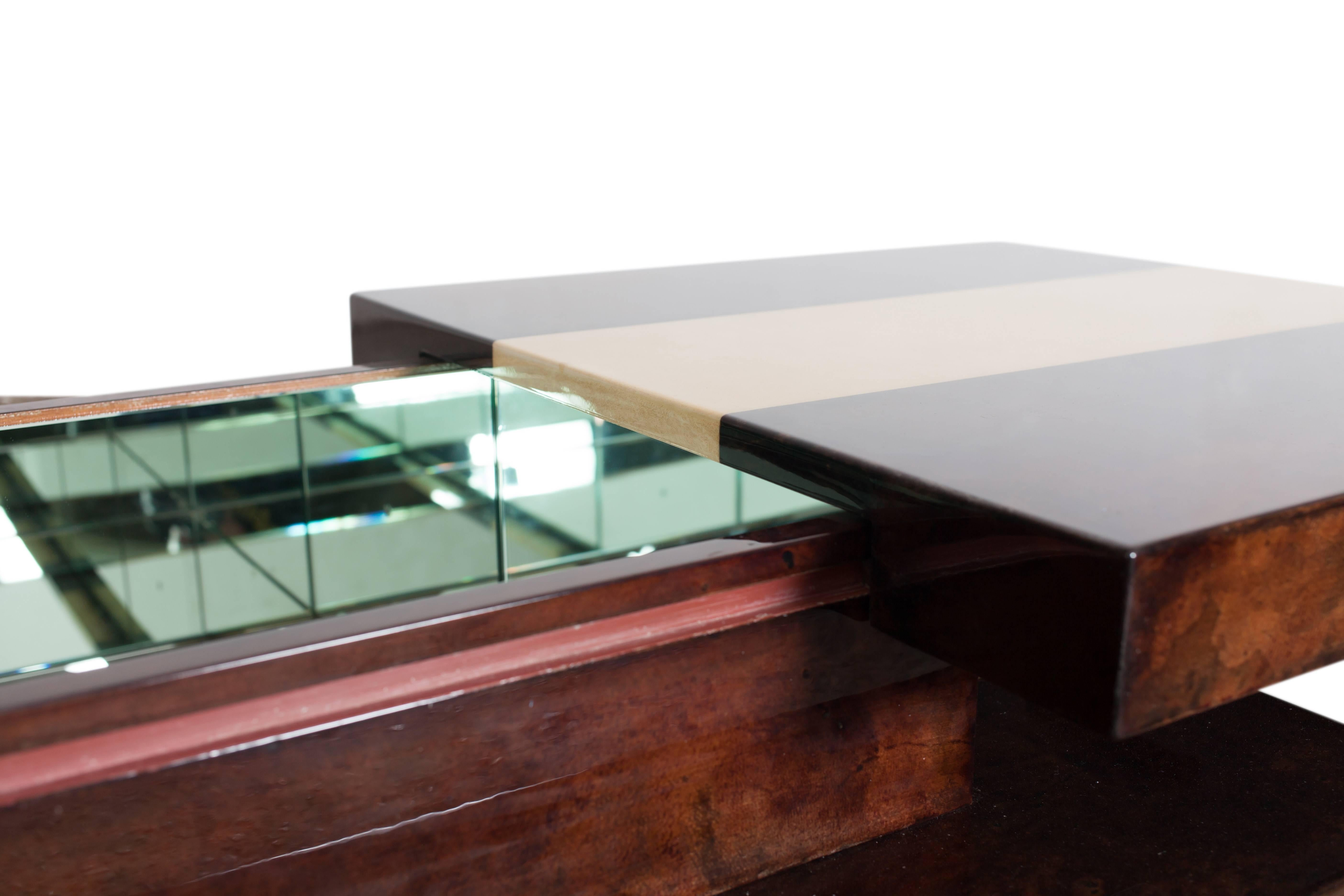 Goatskin Aldo Tura two tier sliding coffee table with hidden bar