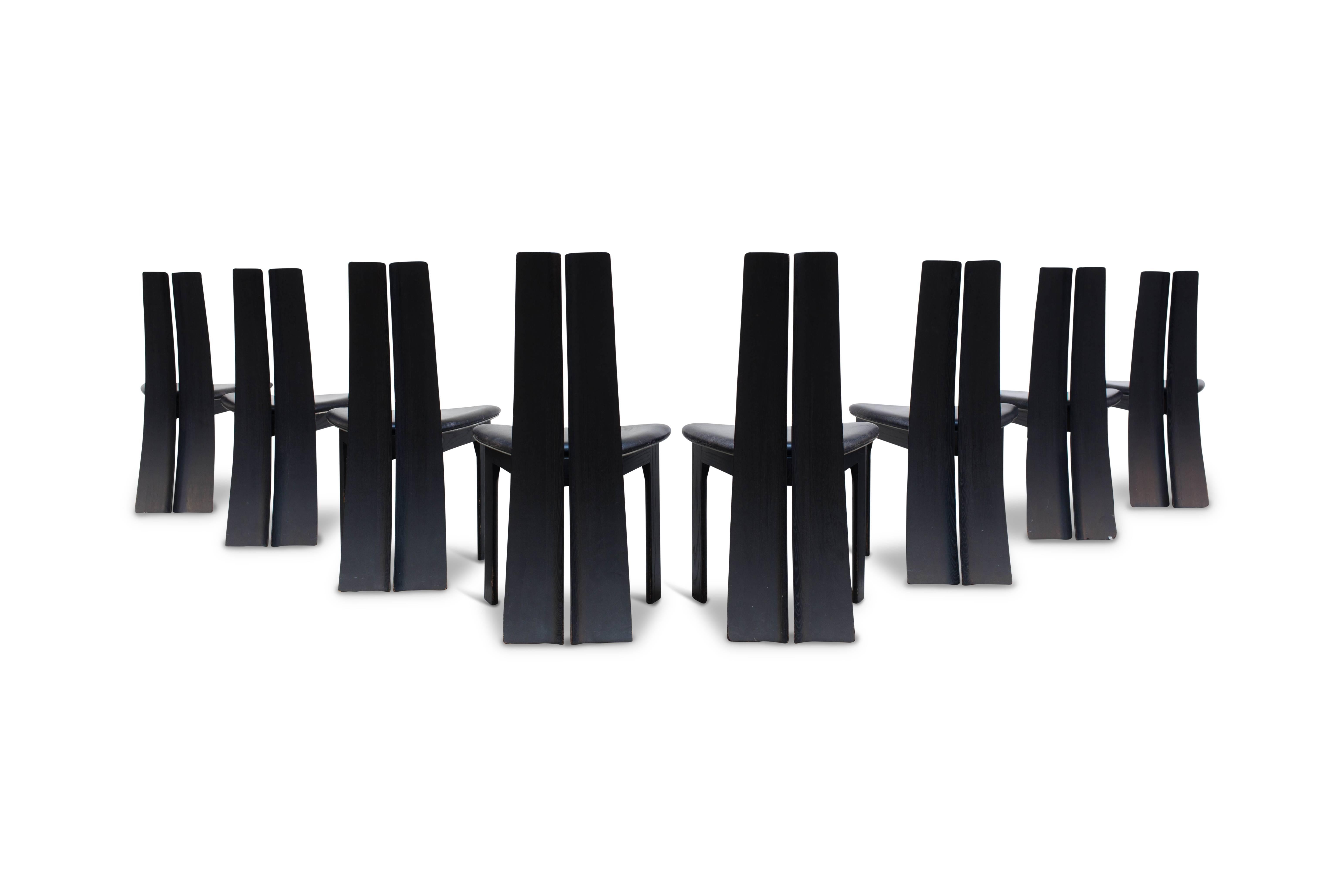Minimalist set of eight dining chairs by Van Den Berghe - Pauvers.

Black leather in great condition - beautiful sculpted chairs with an high arched back

Belgium, 1970s.

 